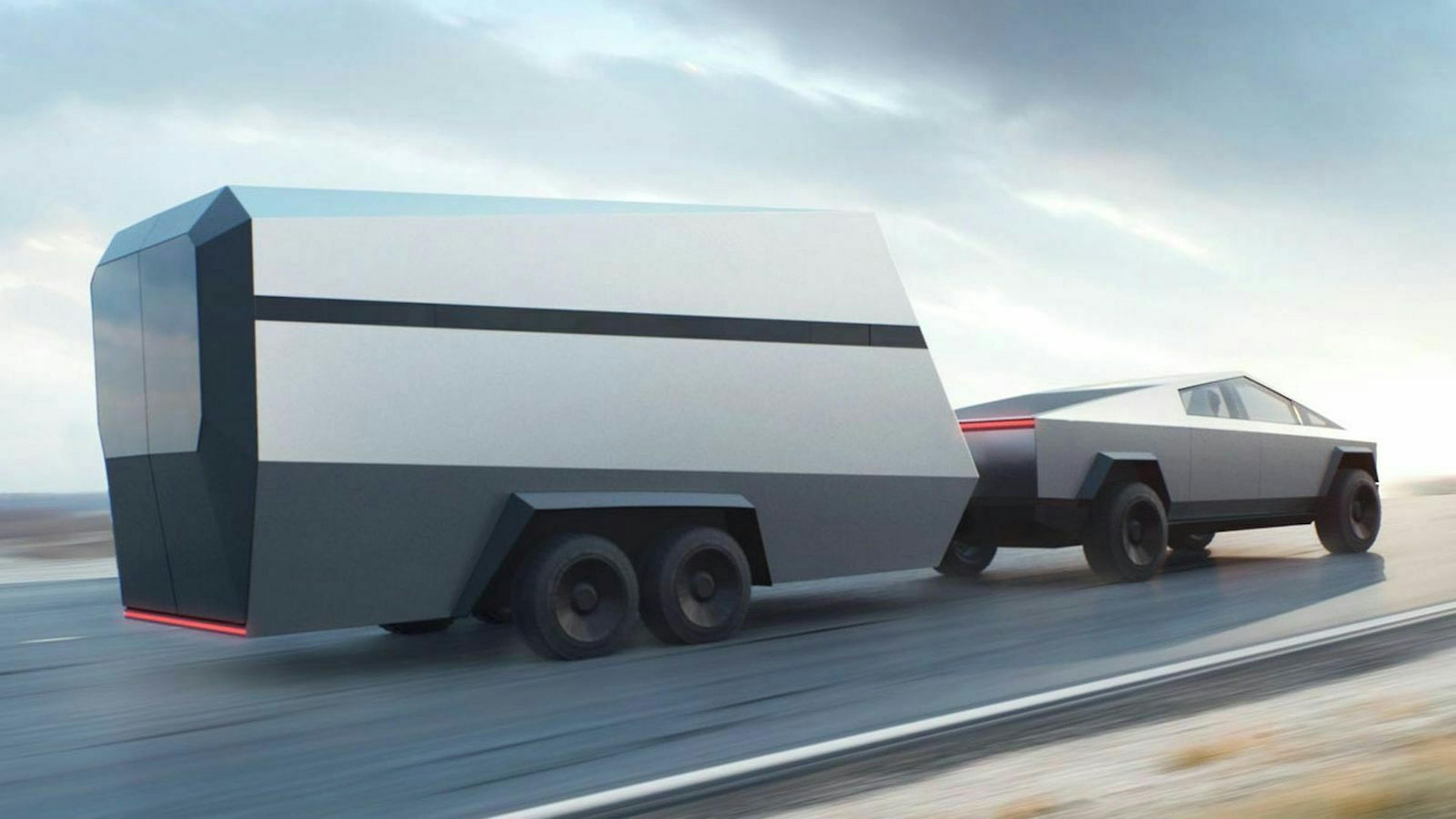 Der futuristische Cybertruck zieht einen ebenso futuristischen Anhänger über eine Landstraße