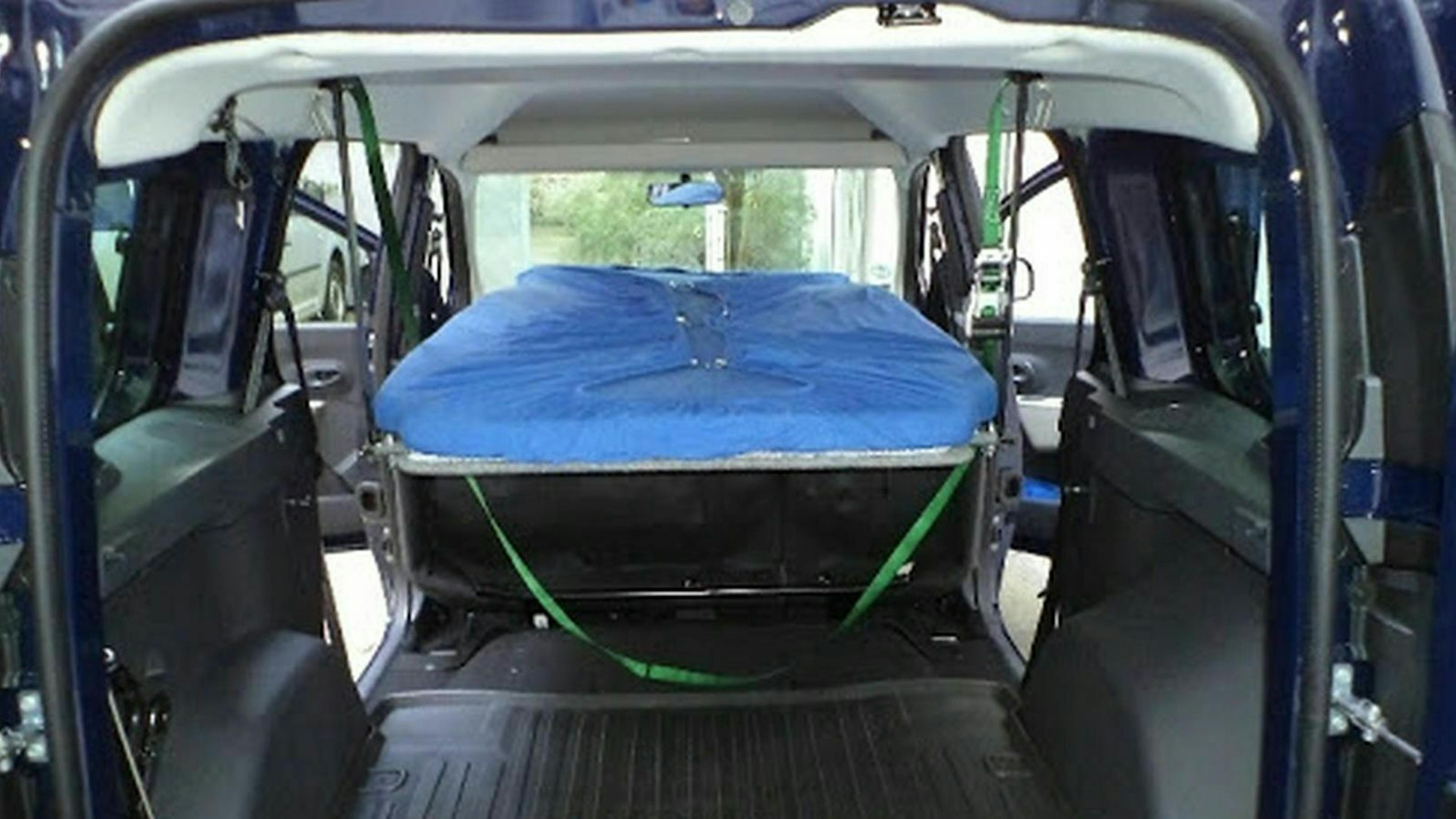 You can see the interior of the car canopy bed van