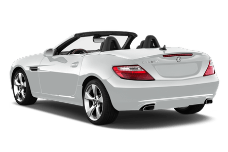 Weißes Cabrio mit offenem Verdeck, von hinten gesehen. Zwei Sitze, sportliches Design, silberne Felgen, Doppelrohrauspuff.