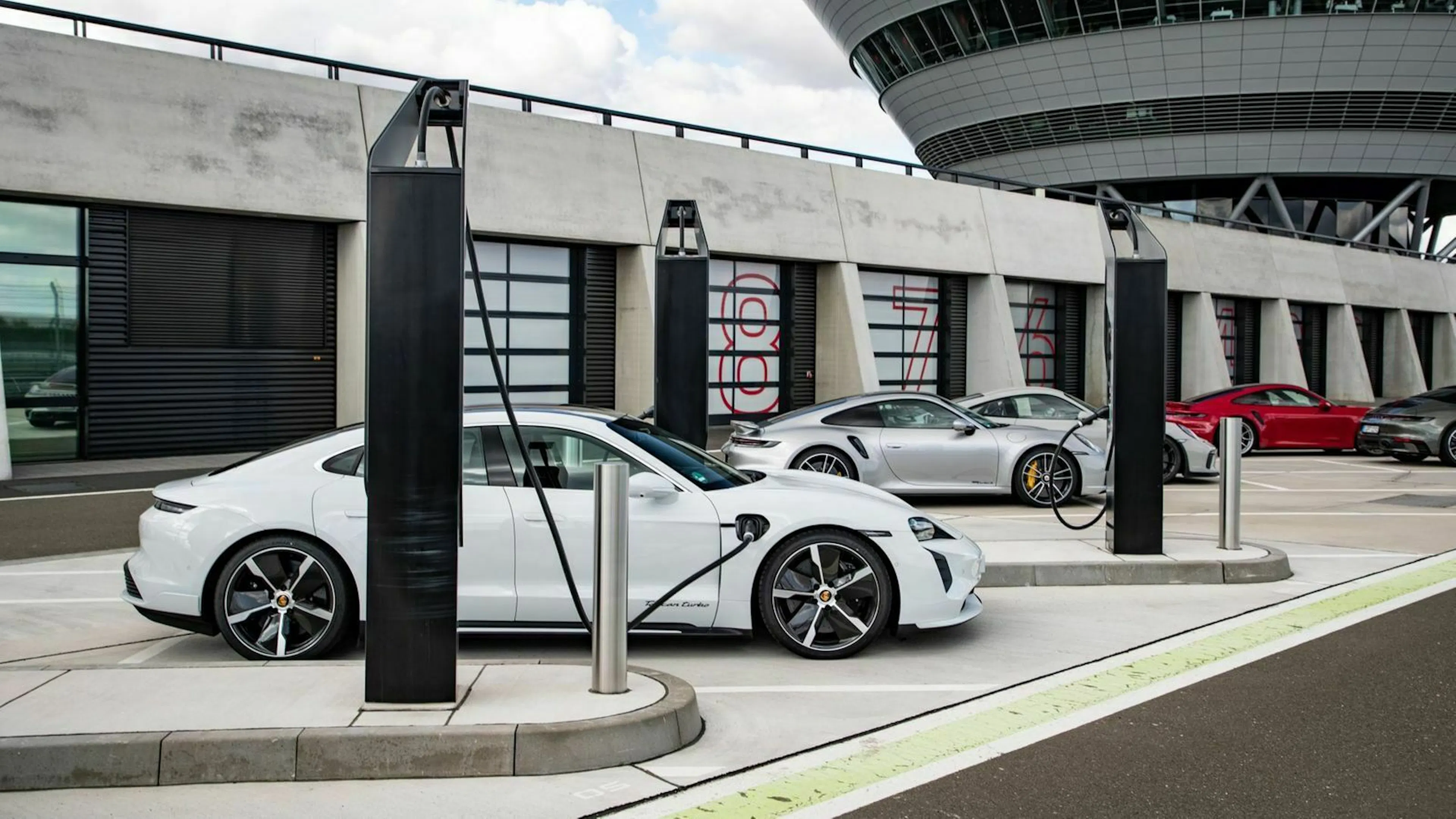 The Porsche Taycan (2020) at a charging station