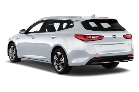 Silberner Kombi in seitlicher Rückansicht. Modernes Design, glatte Linien, getönte Scheiben und Dachspoiler. Markenemblem auf der Heckklappe.