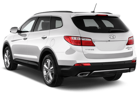 Weißer SUV mit Hyundai-Logo, Rückansicht. Fahrzeug hat rote Rücklichter, silberne Felgen und schwarze Stoßstange.