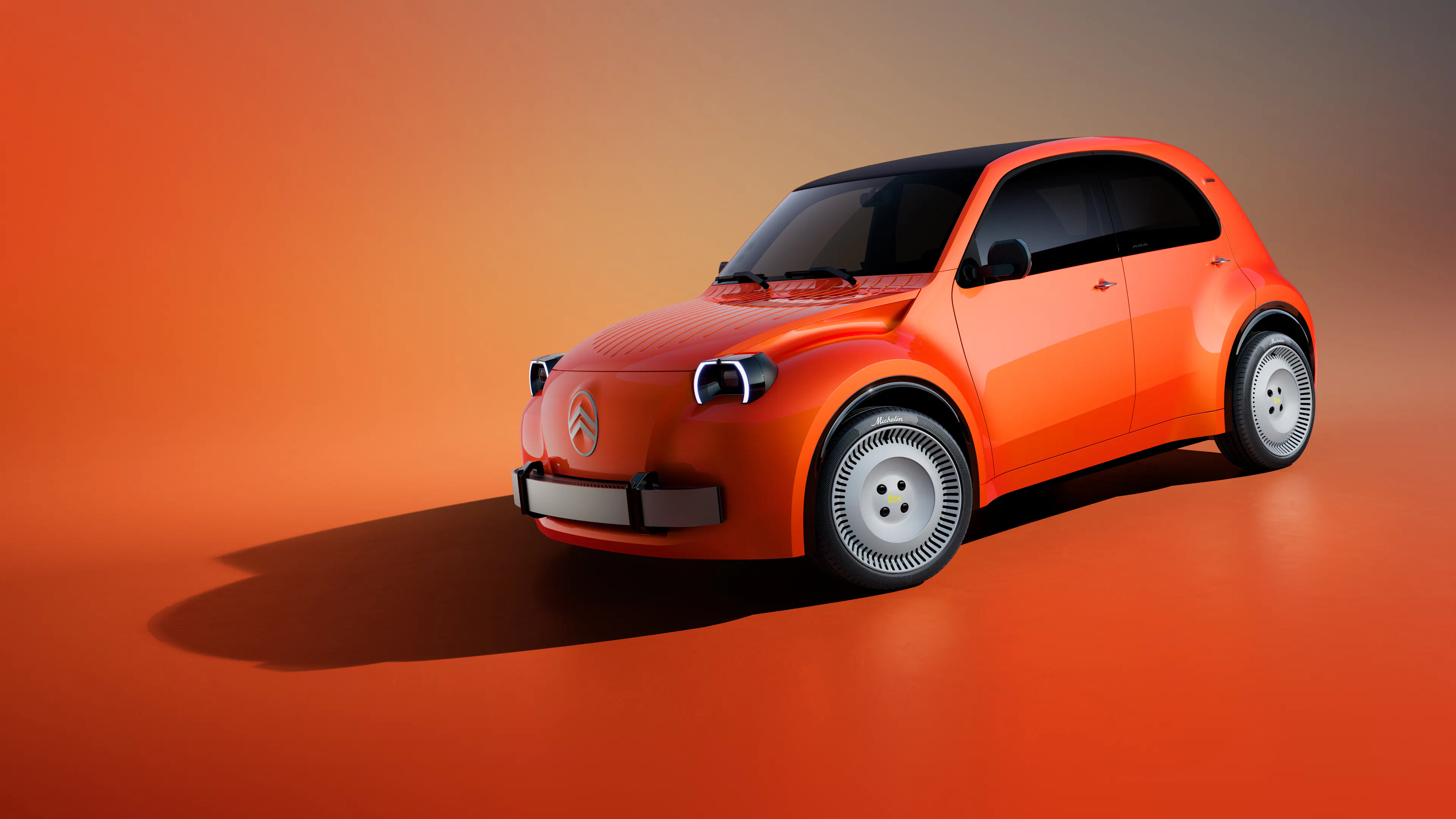 Orangefarbenes Citroën 2CV Concept mit schwarzem Dach, runden Scheinwerfern und hellen Stahlrädern vor orangem Studiohintergrund.
