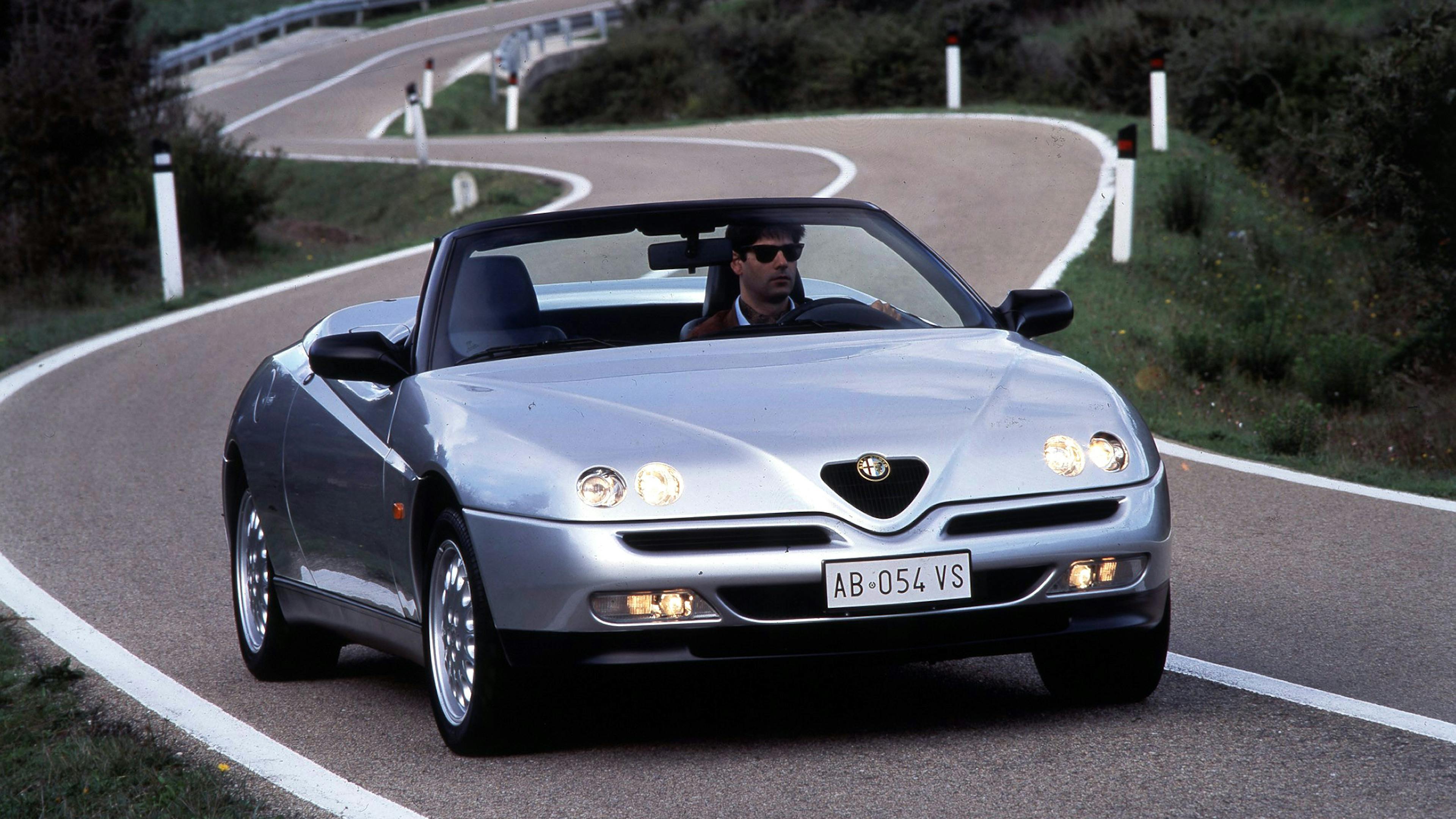 The Alfa Romeo on a winding road