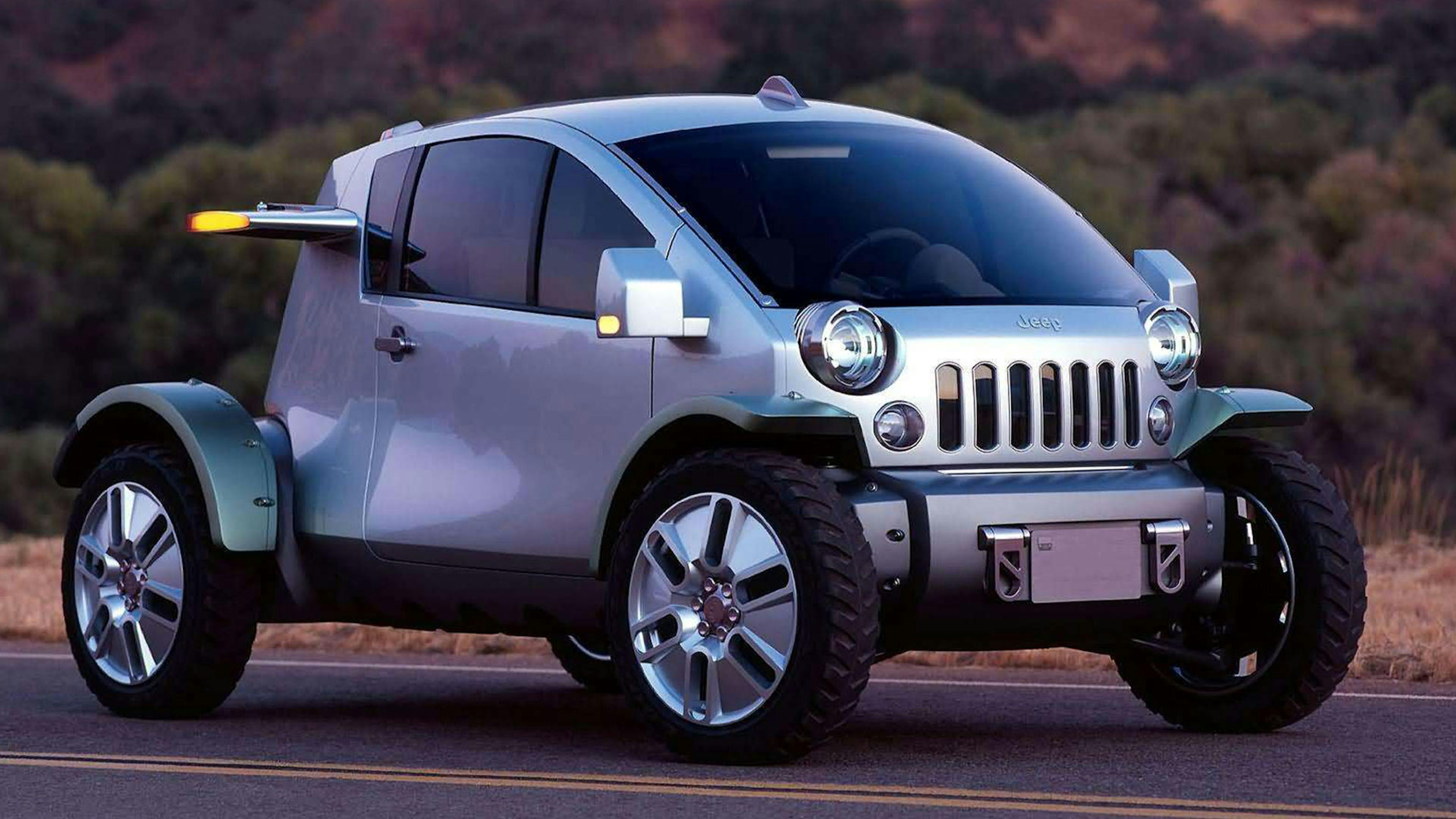 Eine silberne Jeep Treo Autostudie steht am Rand einer Straße.