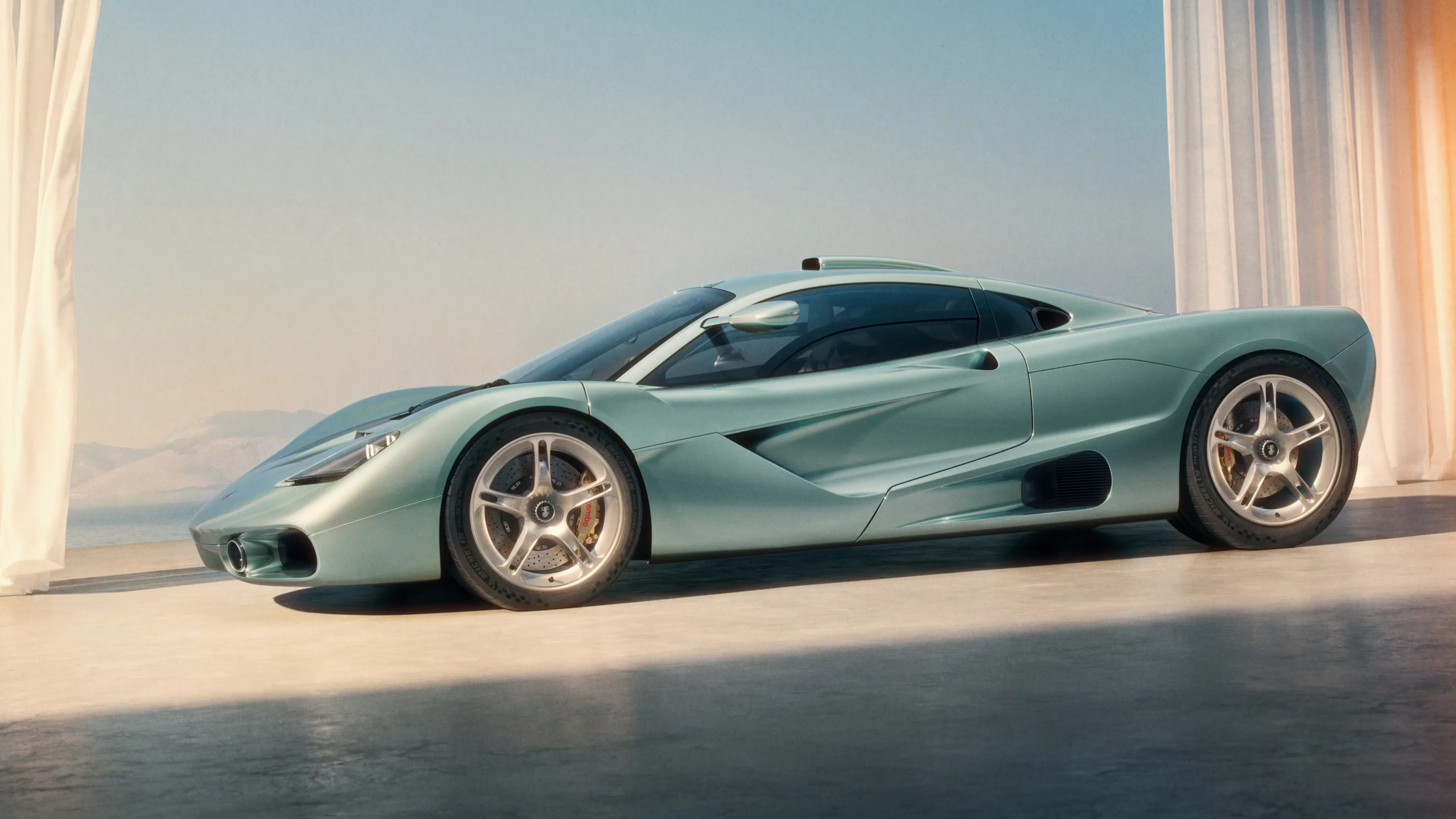 Gordon Murray S1 in der Seitenansicht, limitierter Gran-Touring-Sportwagen mit zentraler Fahrerposition.