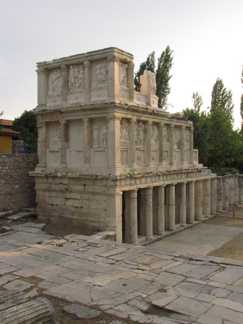 The partial reconstruction of a ceremonial street decorated with high relief sculpture in an architectural setting. The unfinished project will be completed in 2013. (Photo: Kent Severson.)