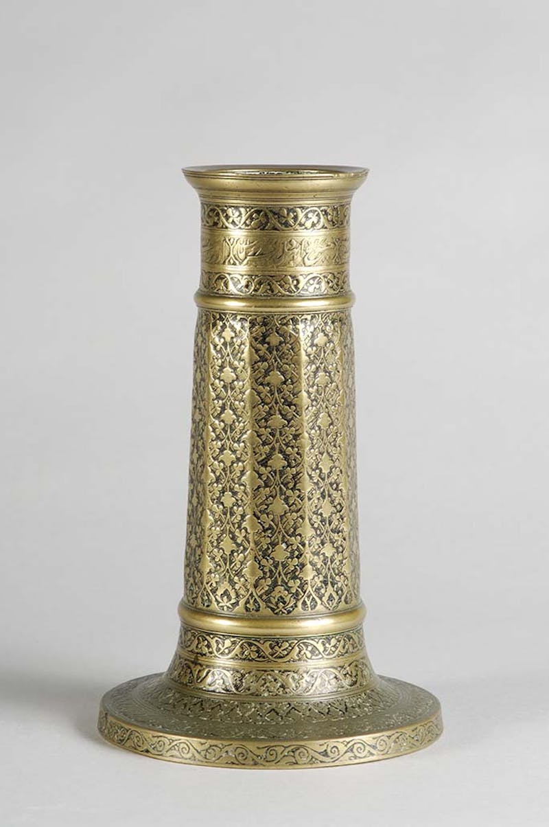 Engraved Lamp or Candle Stand with Floral Motifs Iran, Safavid, 16th-17th centuryBrass and nielloShangri La Museum of Islamic Art, Culture & Design54.102