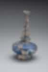 Figure 1: 47.91 Blue Blown-Glass Sprinkler with Applied Decoration, Iran, Seljuq, 11th-12th century Glass, cobalt pigment Overall: 7 x 4 1/8 in. (17.8 x 10.5cm)