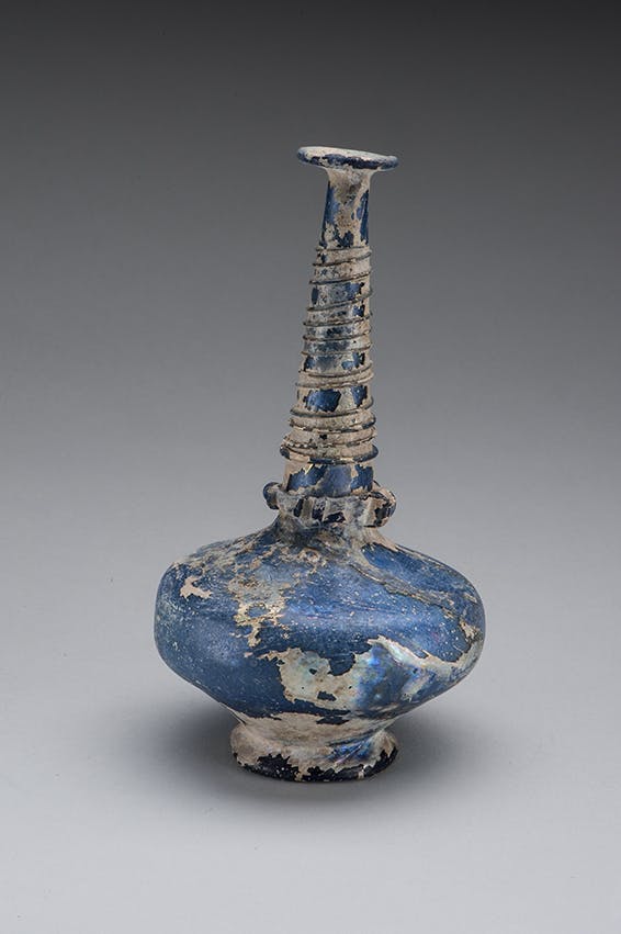 Figure 1: 47.91 Blue Blown-Glass Sprinkler with Applied Decoration, Iran, Seljuq, 11th-12th century Glass, cobalt pigment Overall: 7 x 4 1/8 in. (17.8 x 10.5cm)