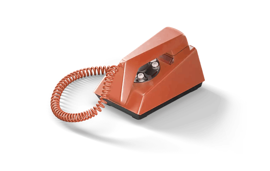 A 70s-style landline phone with a spiral cord and a circle-shaped dial-pad reminiscent of rotary phones.