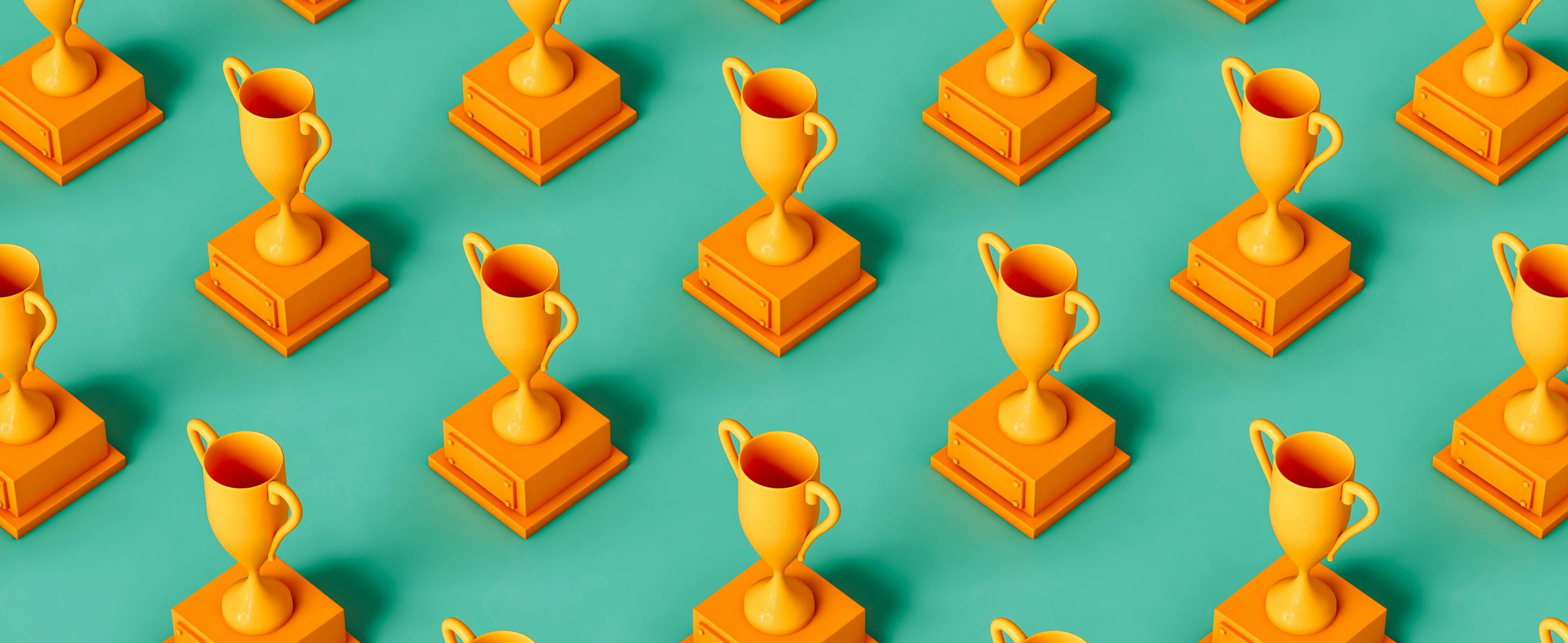 Multiple yellow trophies in even rows on a turquoise background
