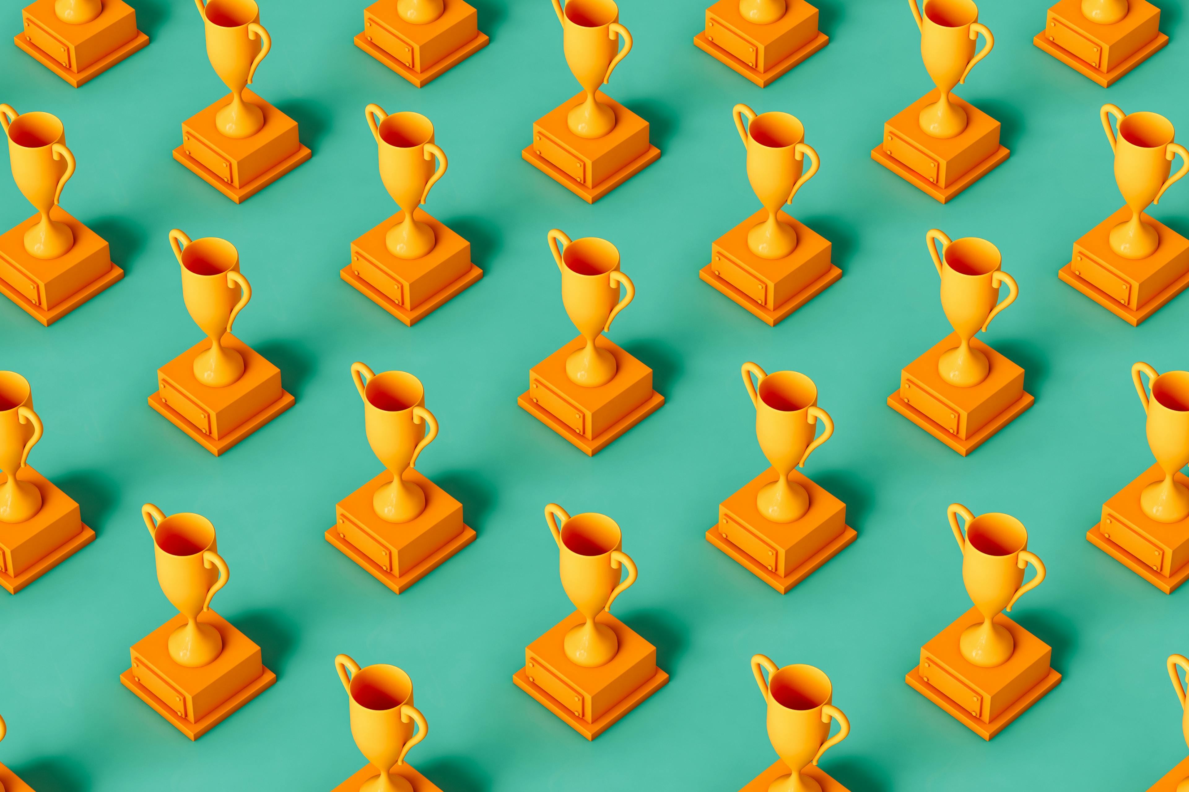Multiple yellow trophies in even rows on a turquoise background