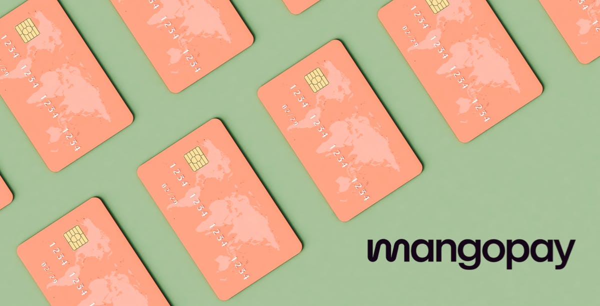 Sage green background with salmon pink credit cards with world map on the upper left corner, Mangopay logo in bottom right corner.