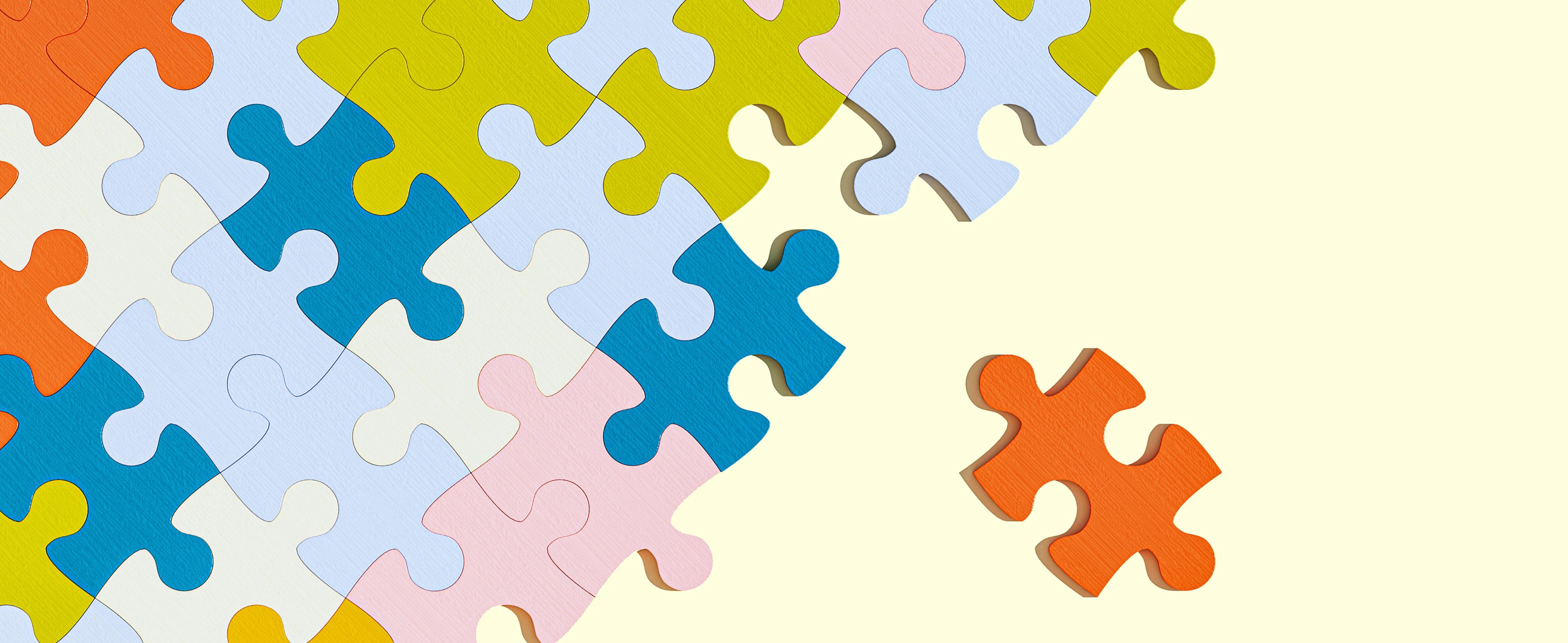 Half of the image diagonally shows colorful, assembled puzzle pieces on a pale yellow surface. A loose red piece is clearly missing from the assembled puzzle.
