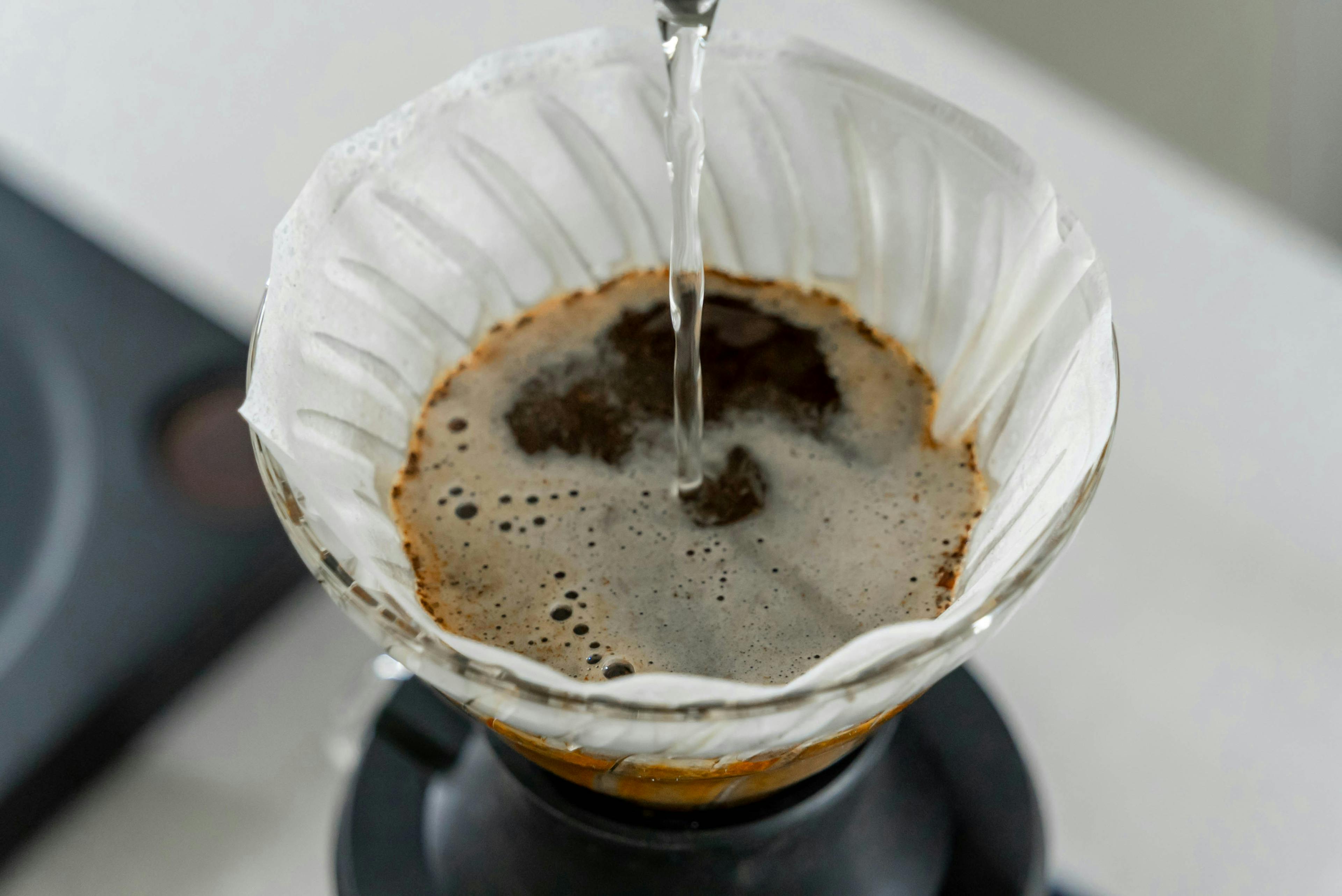 Water being poured into a coffee filter