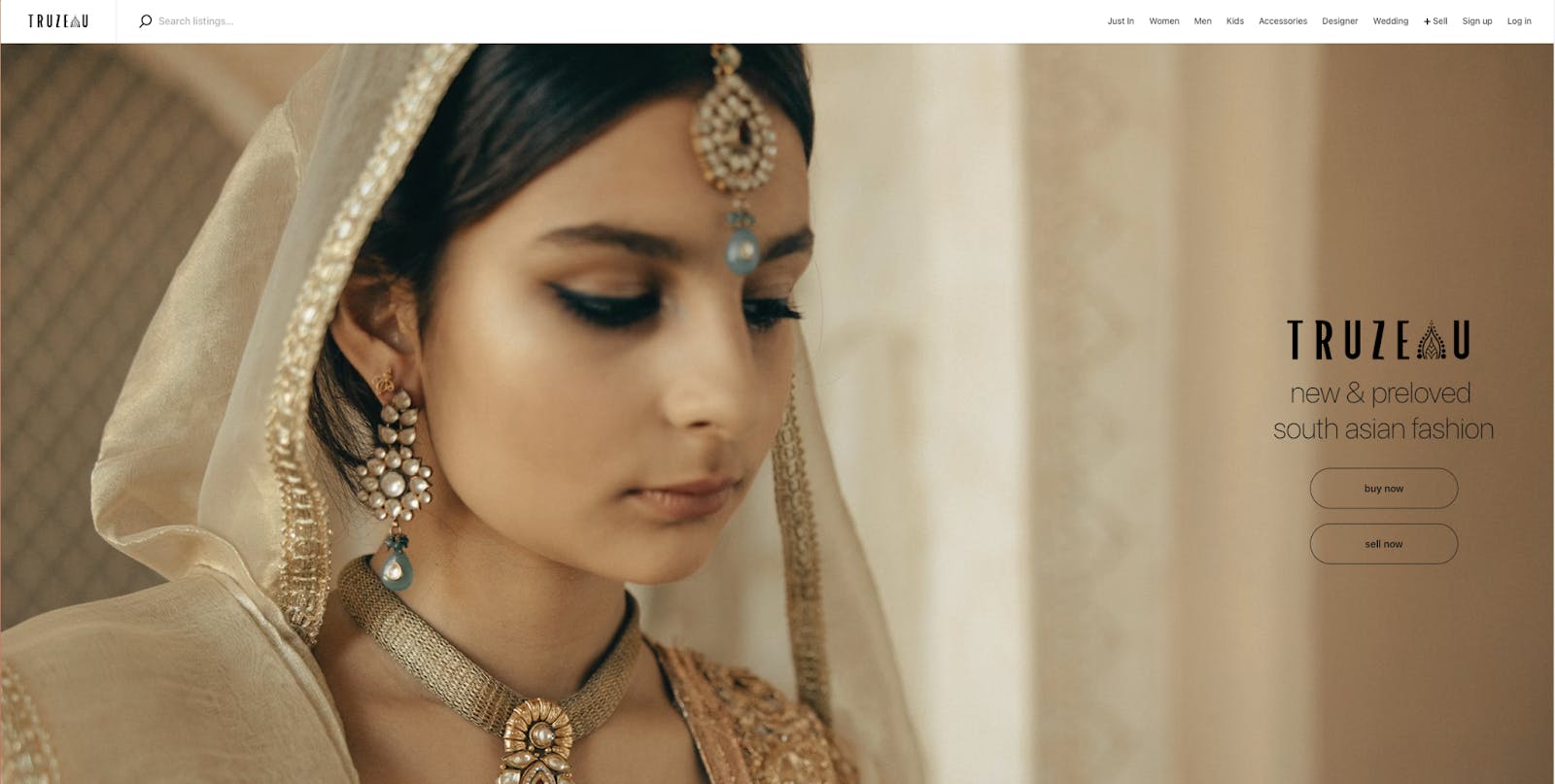 The homepage of Truzeau features a woman wearing traditional South Asian jewellery and a tagline highlighting new and preloved fashion.