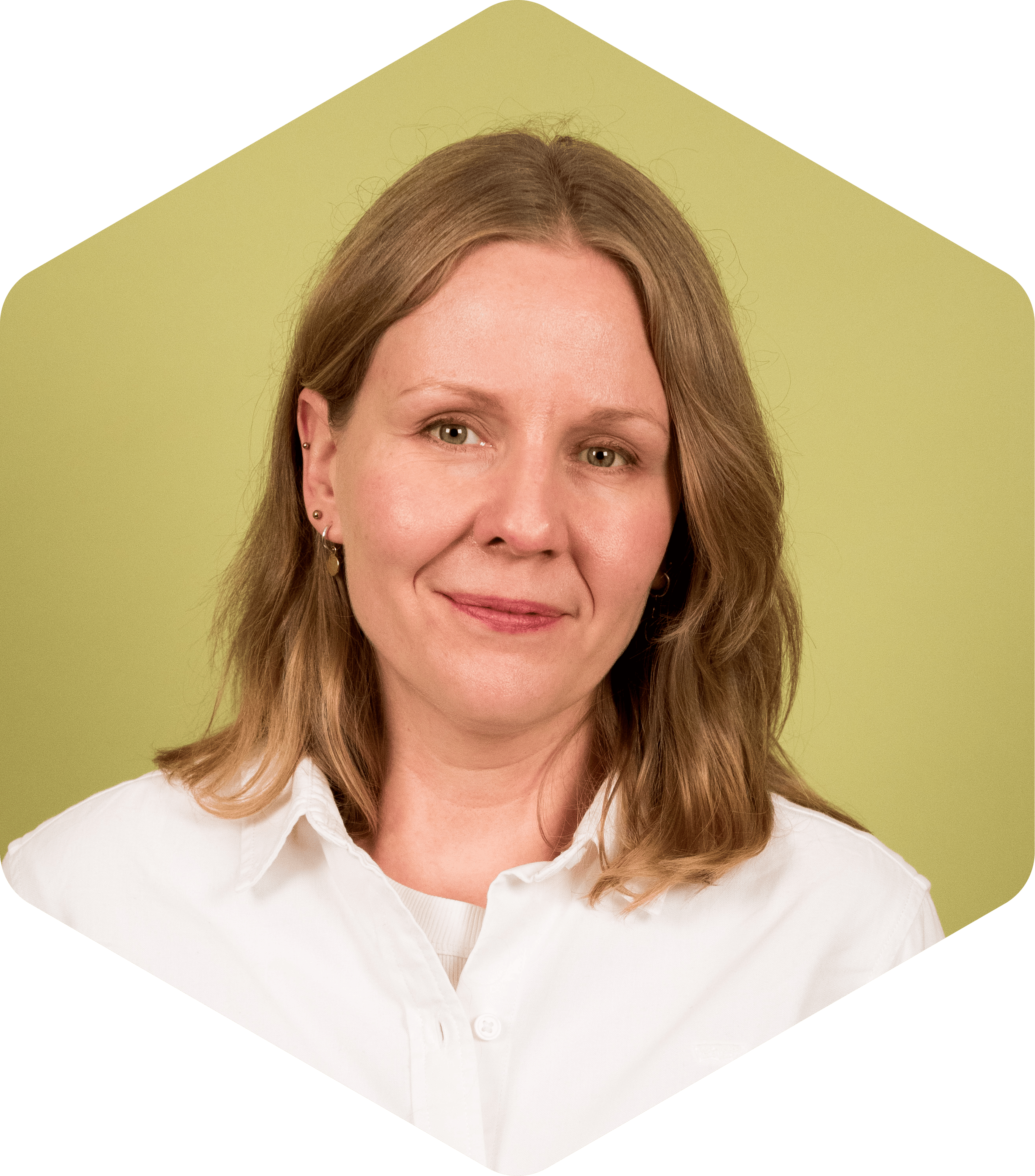 Mira wearing a white shirt, facing the camera on a light green background.