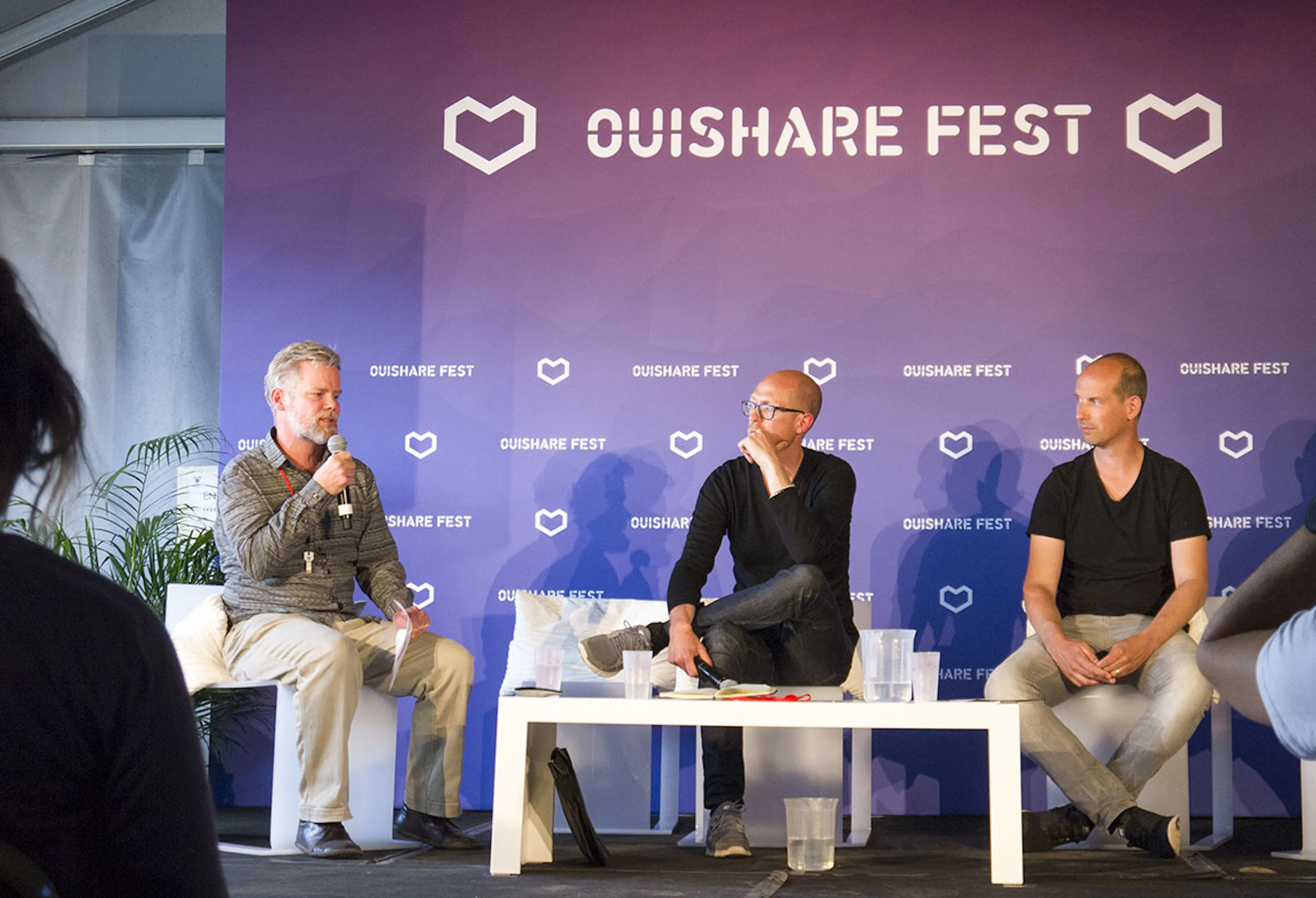 Neal Gorenflo hosting the talk at Ouishare fest. Photo by Antti Virolainen. Profile photo by Sebastiaan ter Burg.