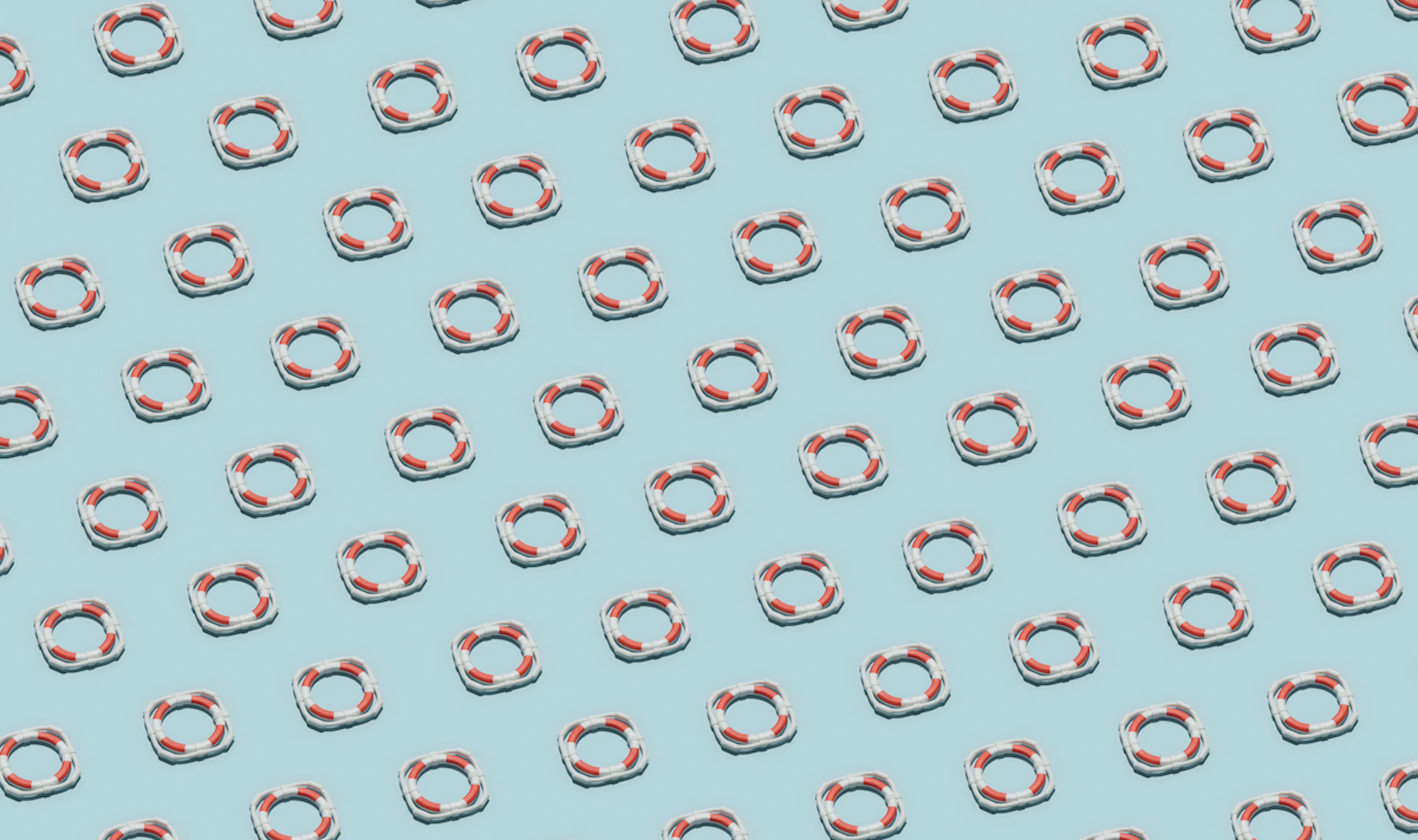 Red-and-white ifebuoys arranged in sequence.