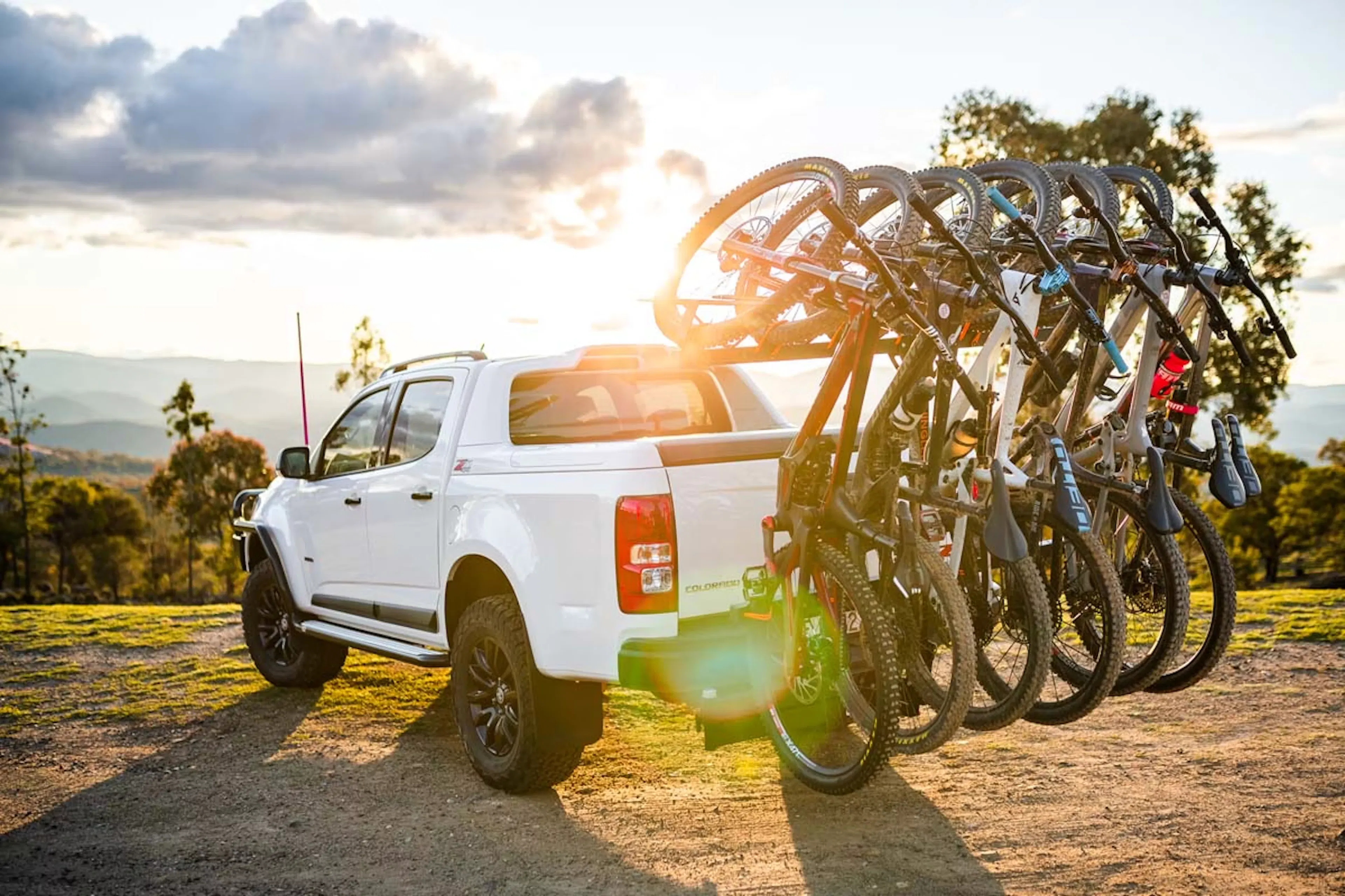 A pickup truck with a mount carrying six bicycles