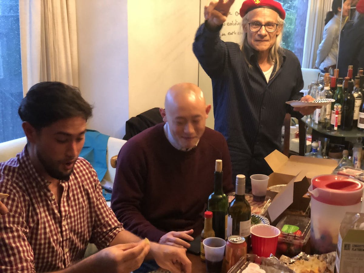 Aaron waves to the camera at a ShelterTech gathering