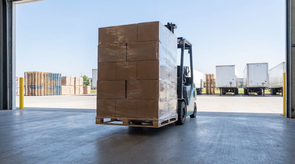 Efficient inventory management at a modern fulfillment center showing organized shipping pallets, representing strategic logistics and FBM cost savings.