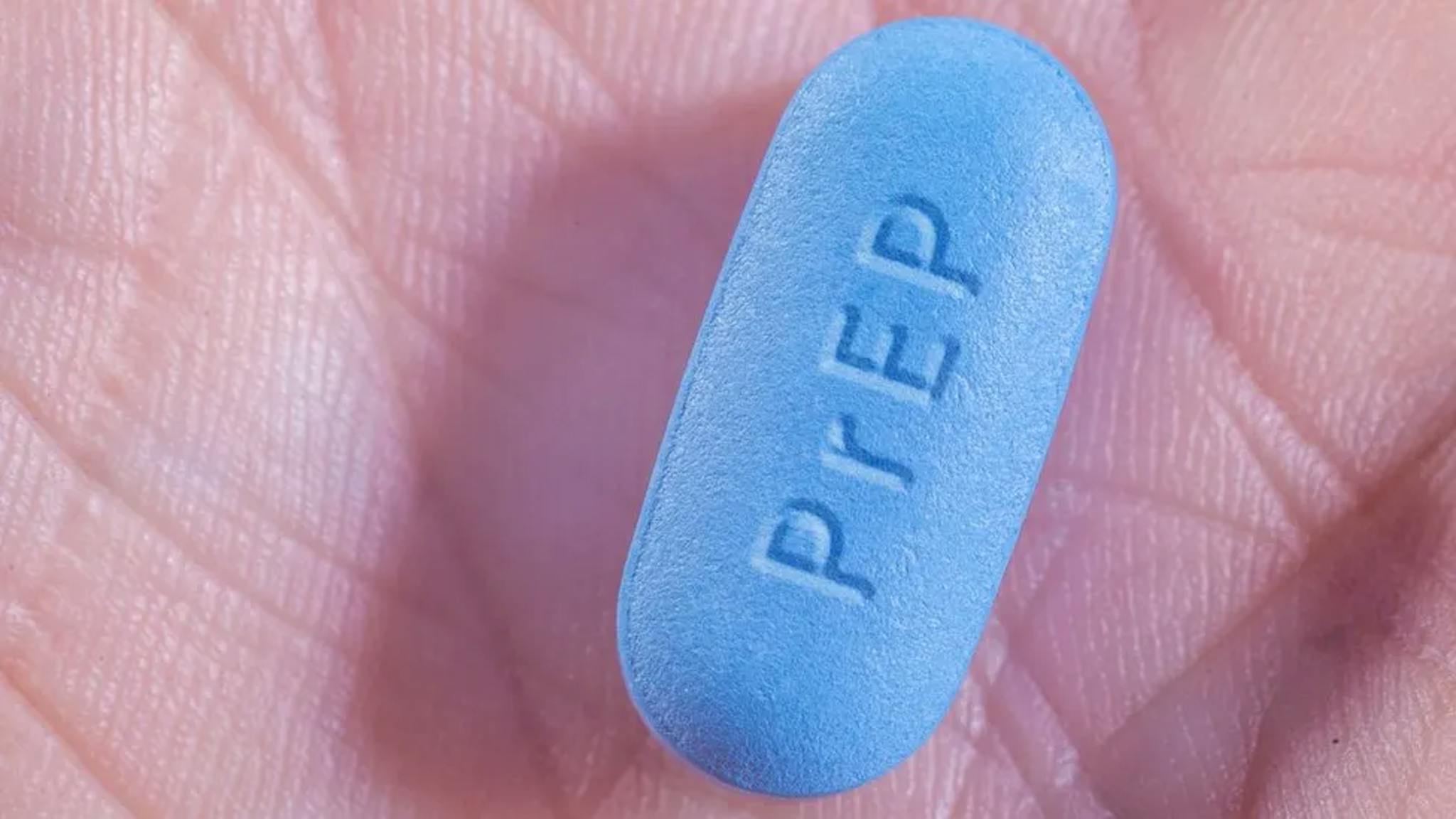 Image of PrEP Tablet in a person's hand