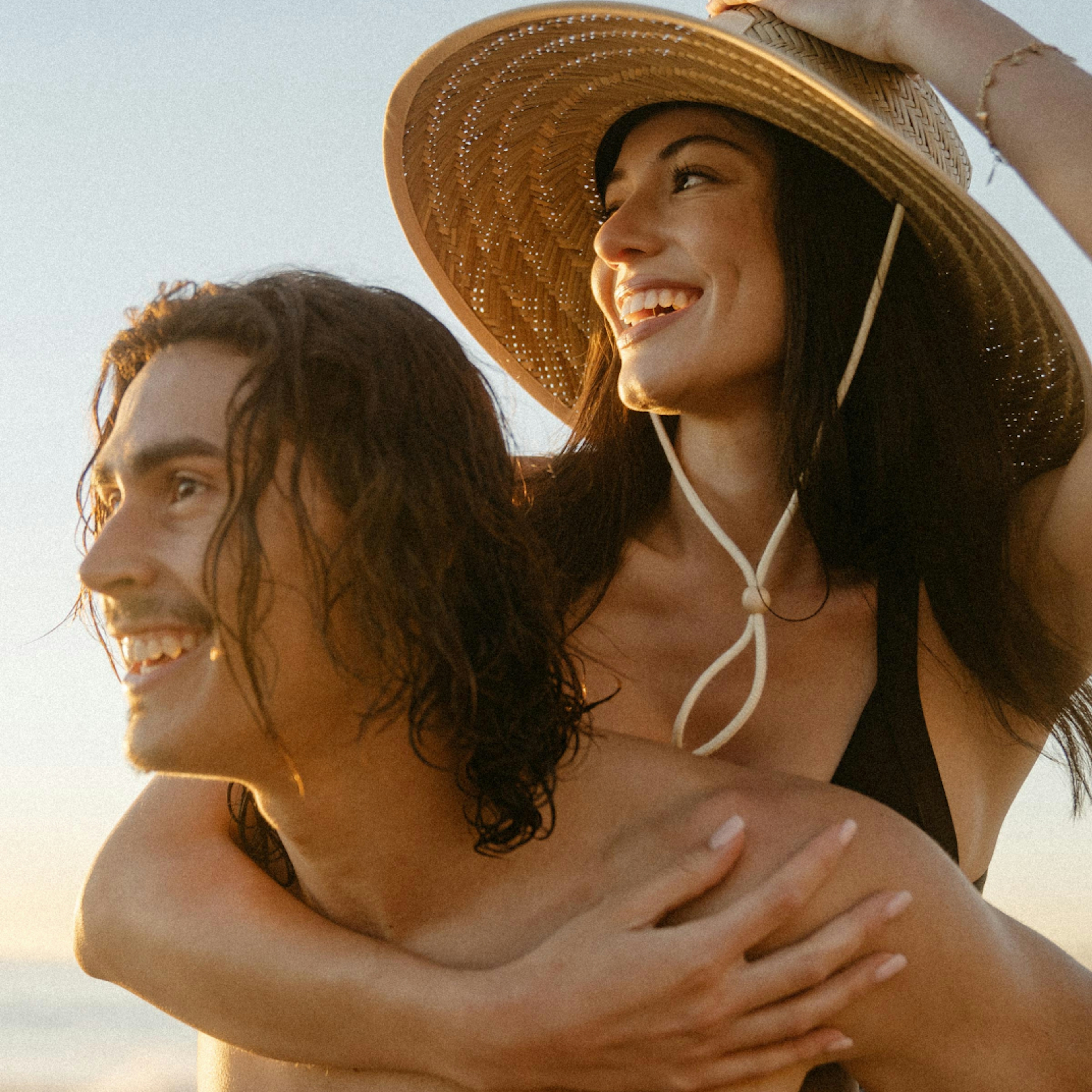 People at the beach with a Hemlock Hat