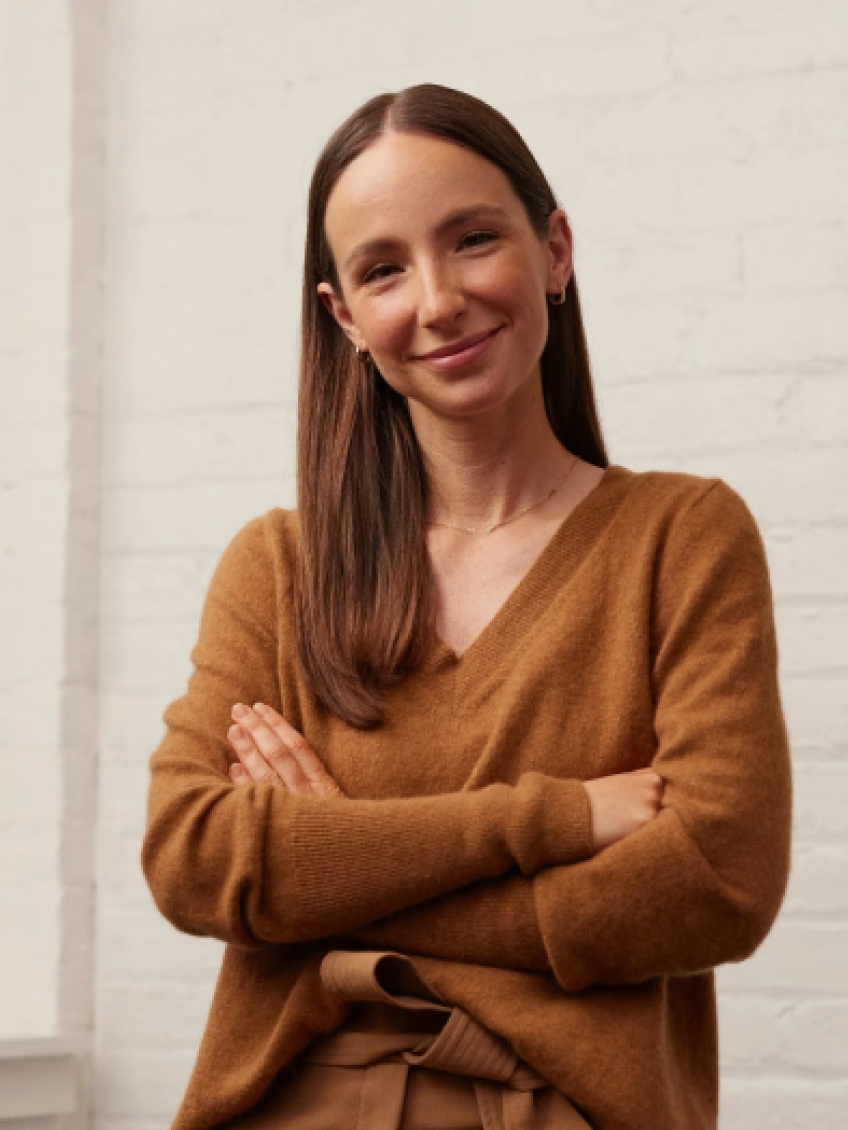 A woman smiling