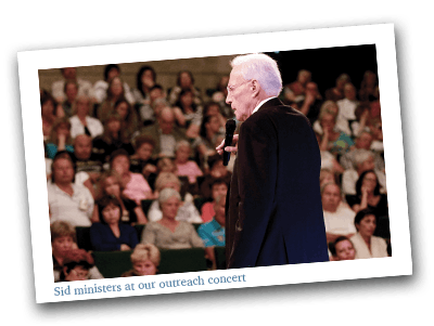 Sid ministers at our outreach event