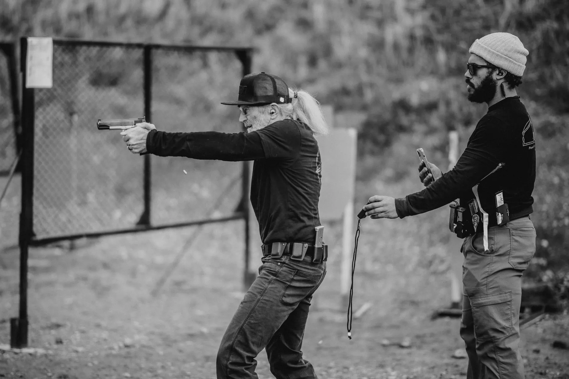 Mark Twight competing in a pistol match after returning to competitive shooting in 2024