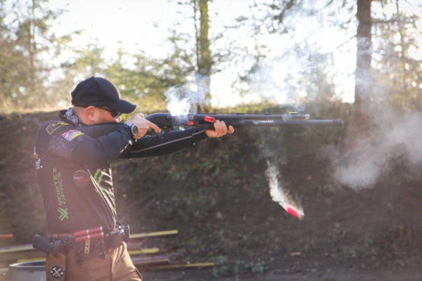 Firing a pump action shotgun 