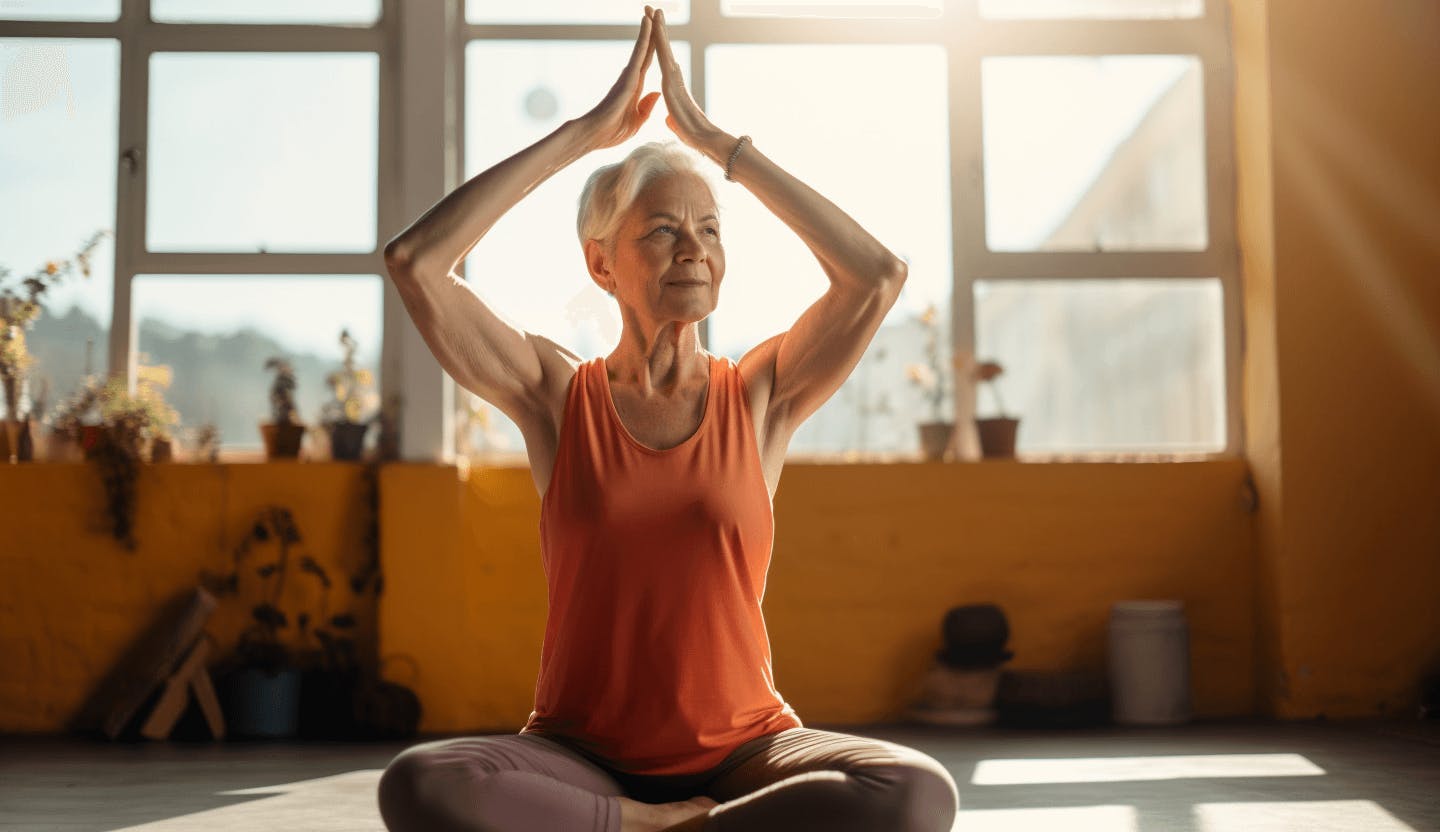 femme de 67 ans faisant du yoga