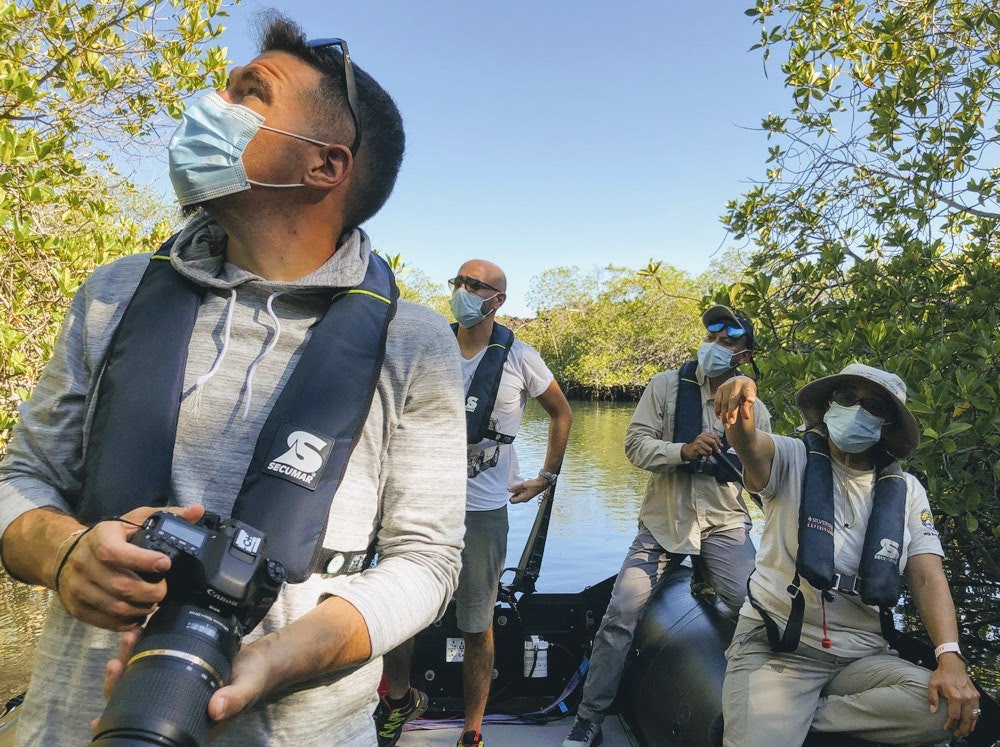 Sketchin - Case - Silversea Silver Origin Galapagos Islands - people exploring the island on a small boat
