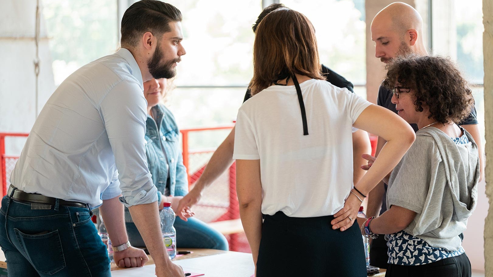 Collaboration and confrontation between teams