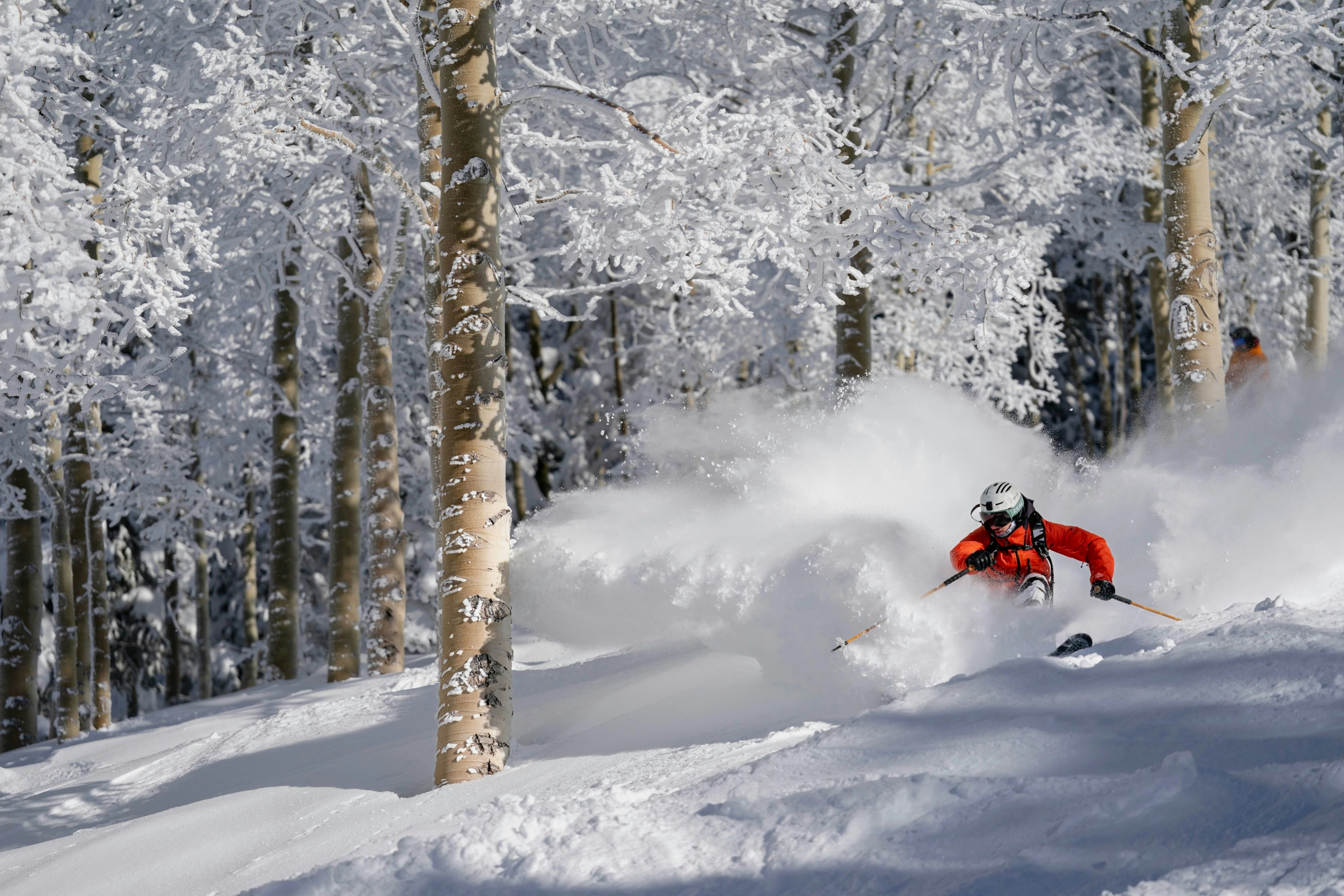 A skier navigates a snowy slope in Colorado