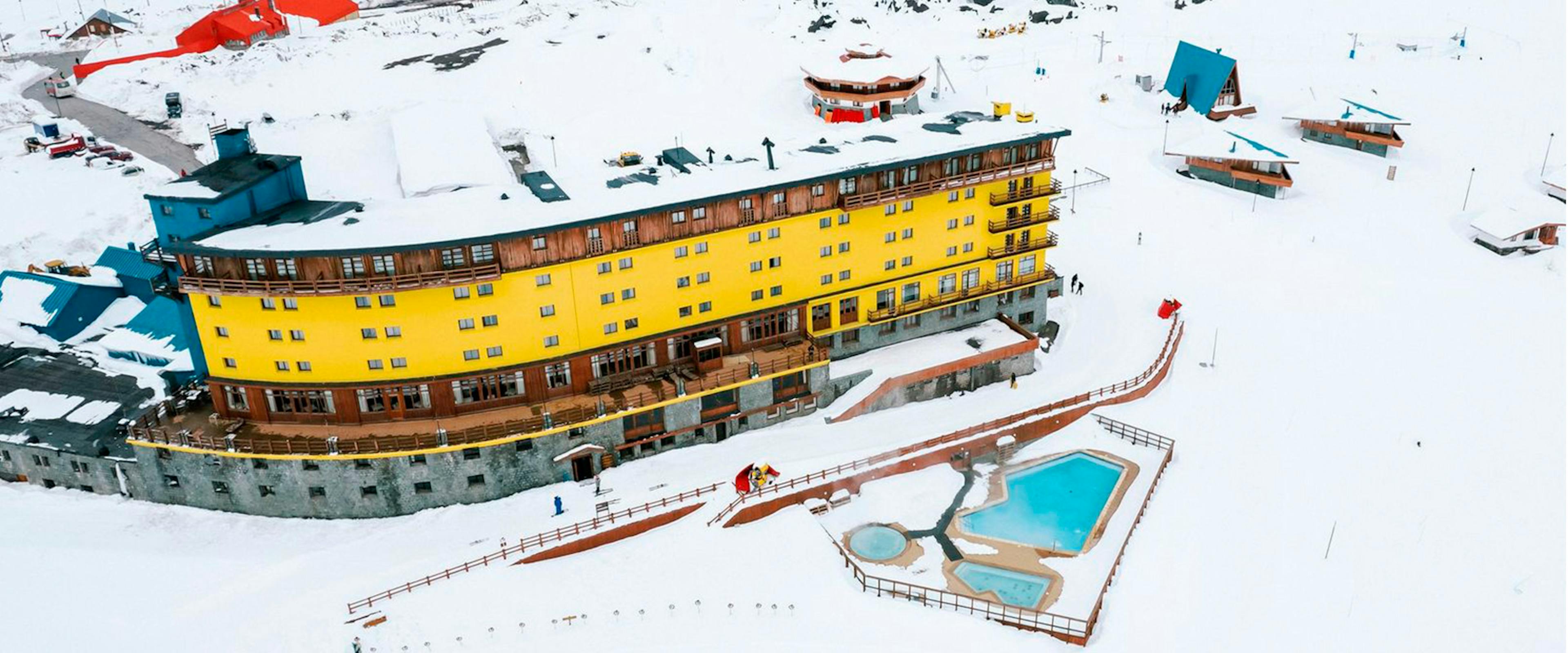 Aerial show of the resort and heated pool at Portillo in Chile, South America.