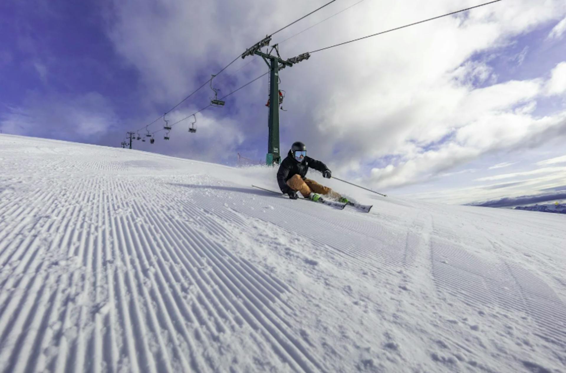 skier on a groomed run at Cerro Catedral ski resort