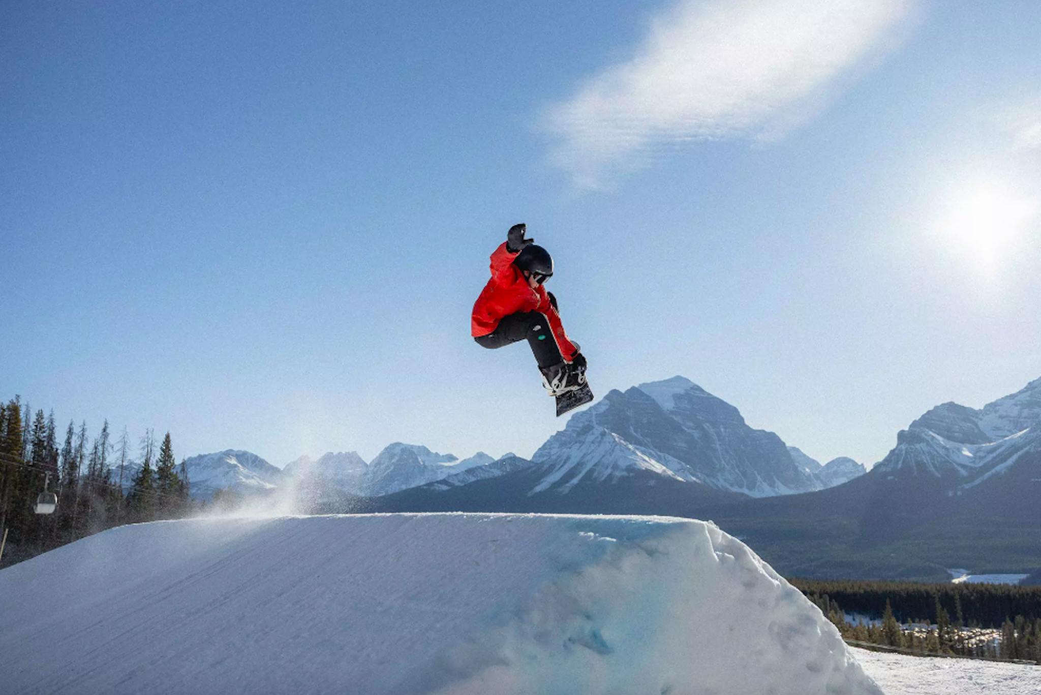 snowboarder getting air at Banff Lake Louise ski resort