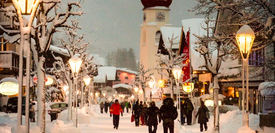 People walking the snowy streets of St. Anton