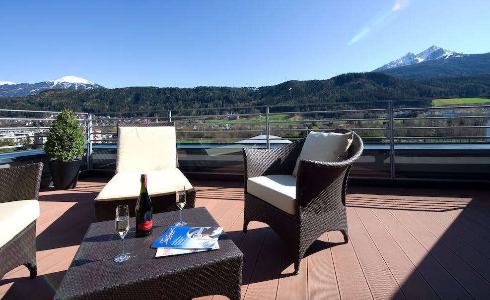 Sunny patio with mountain views at Innsbruck Austria ski resort