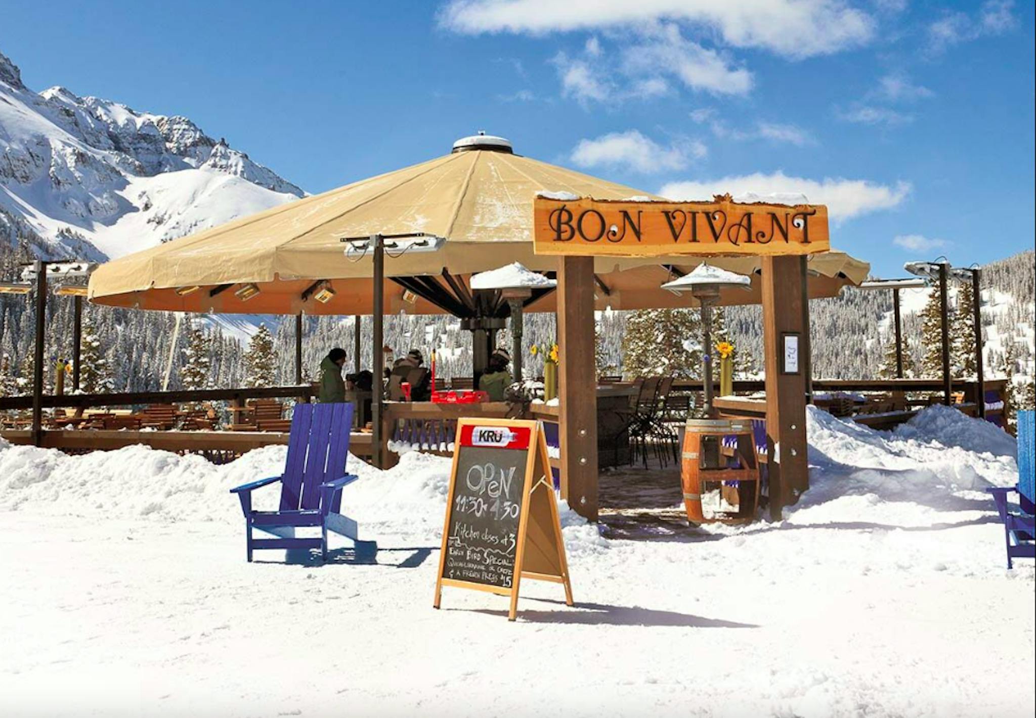 Bon Vivant at Telluride Ski Resort on a sunny spring day with snowy mountain backdrop