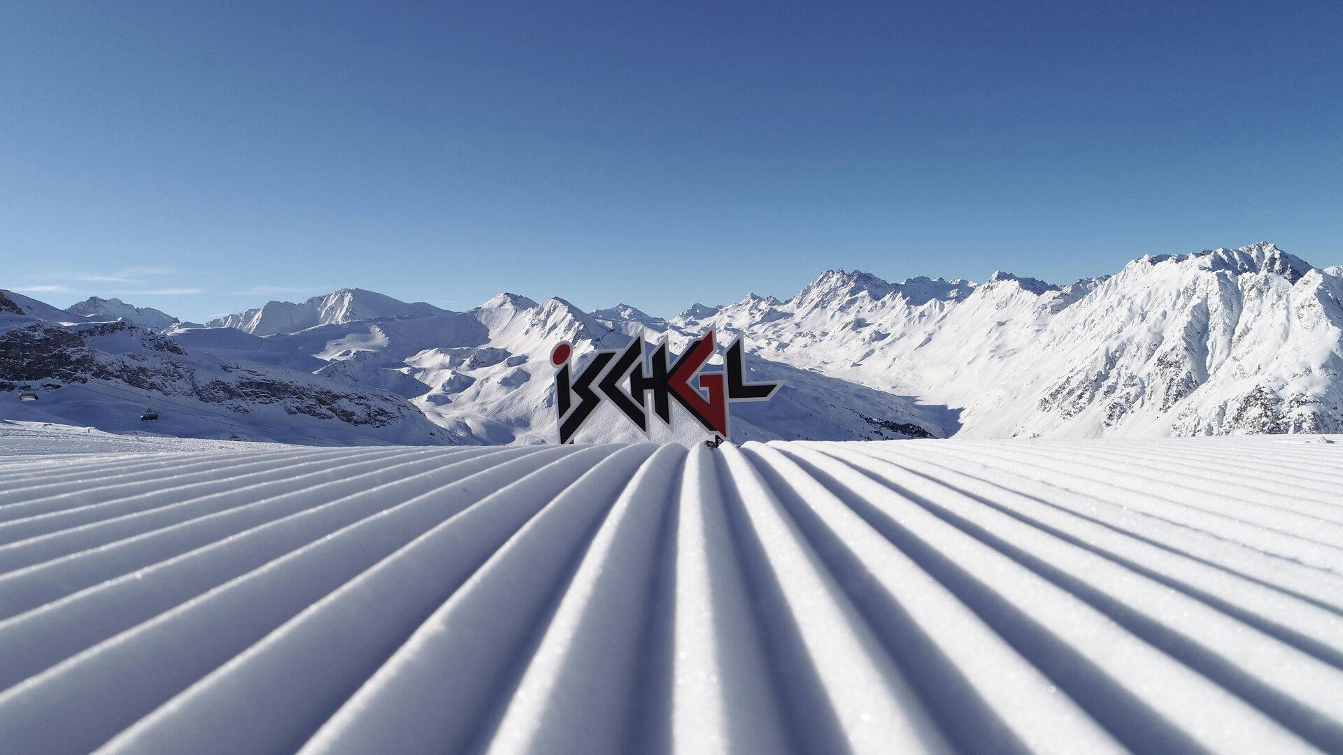 Perfectly groomed corduroy in the morning at Ischgl in Austria, Europe.
