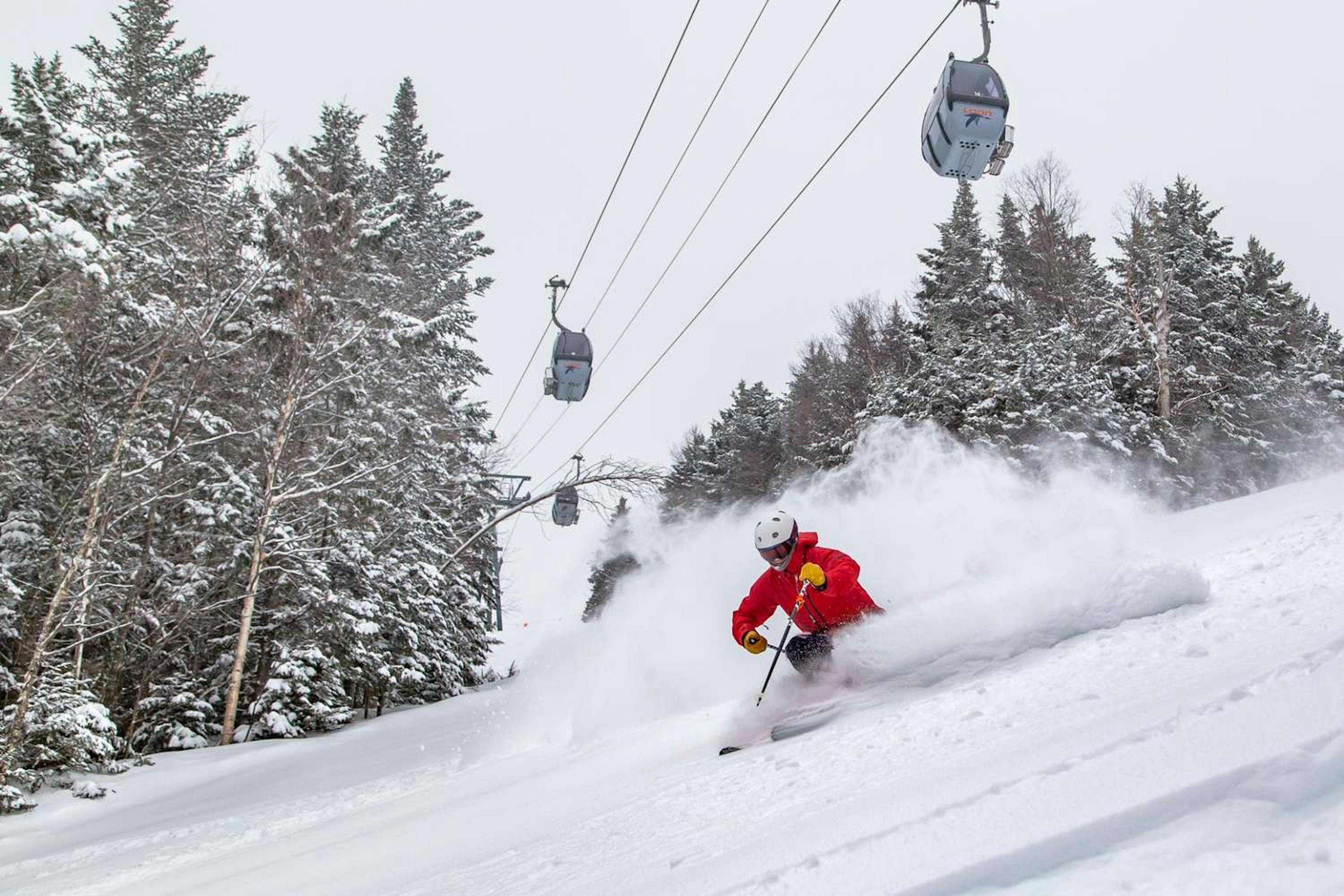 Skier under the gondola at Loon Mountain