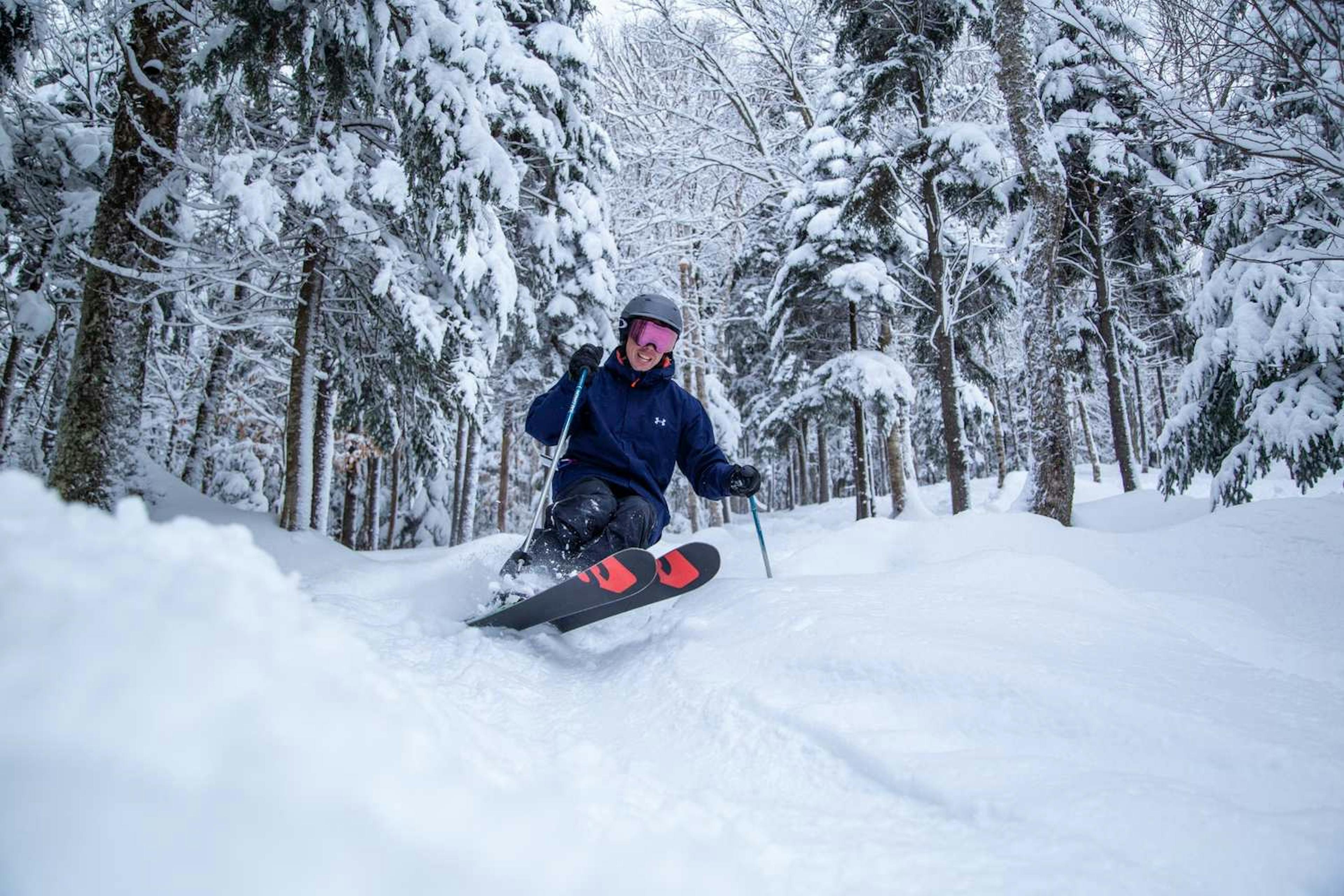 Skier in the trees at Loon Mountain