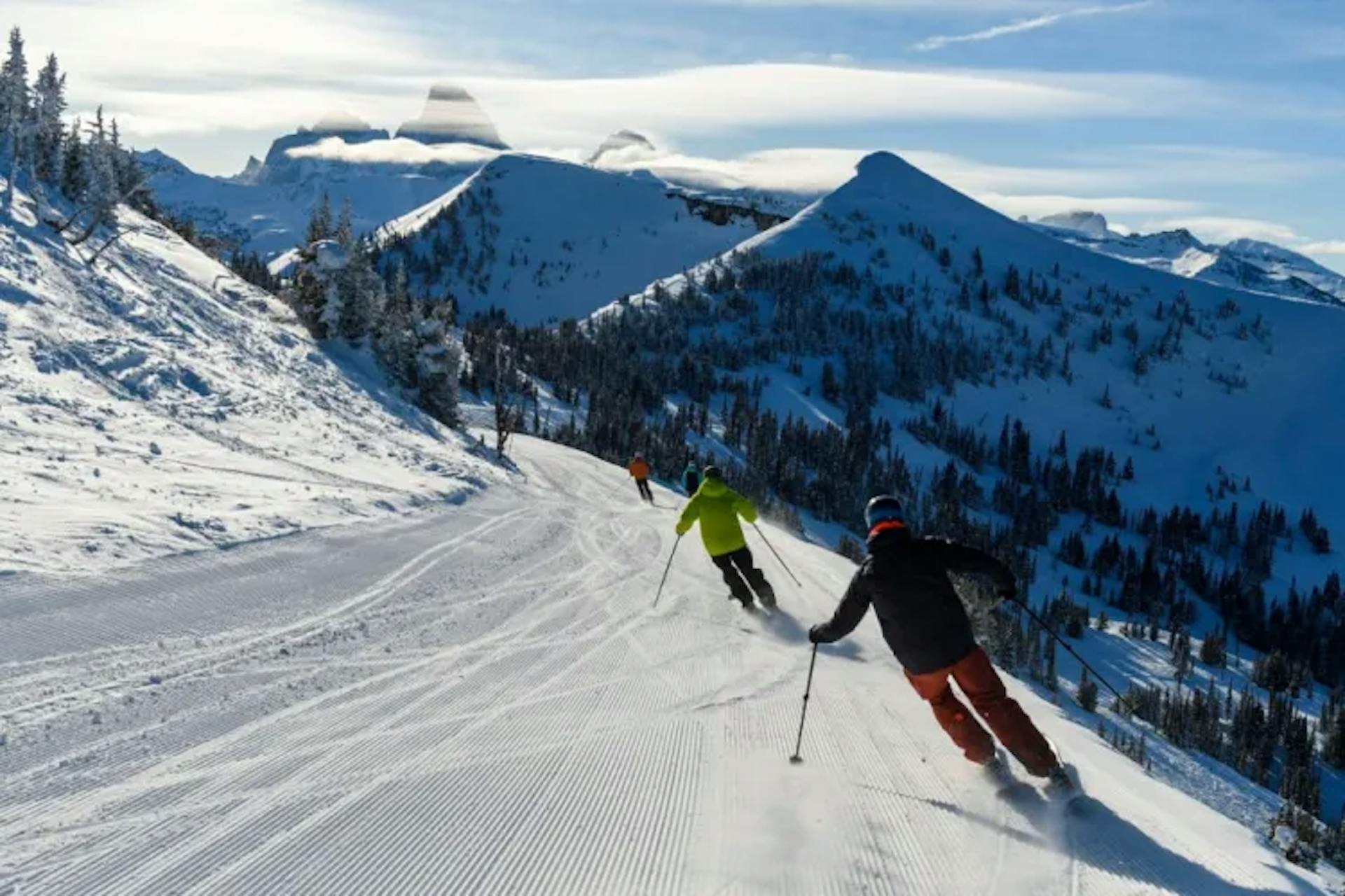 Skiers going down the slop in Grand Targhee Ski Resort.