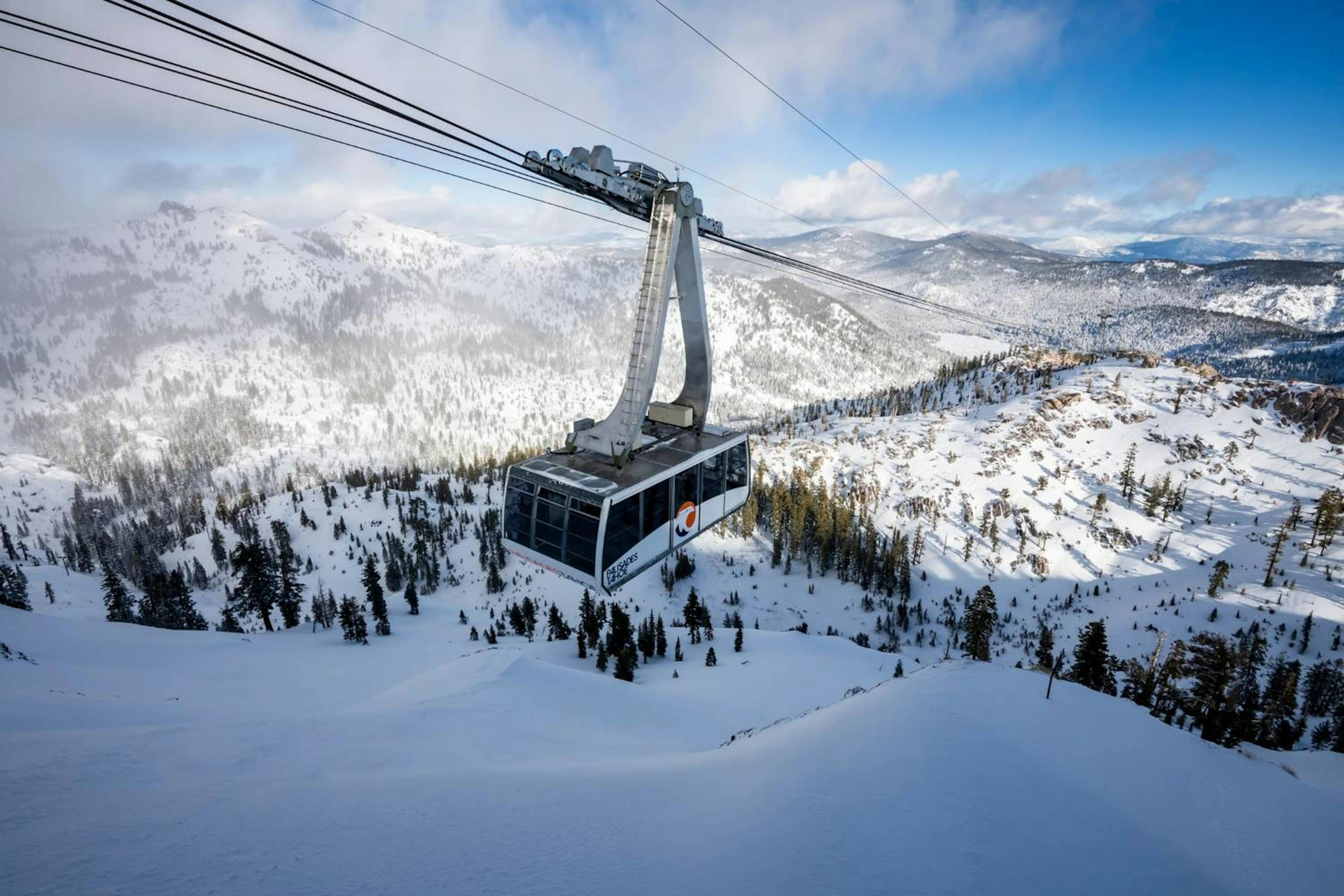 Palisades Tahoe Aerial Tram above fresh snow at High Camp