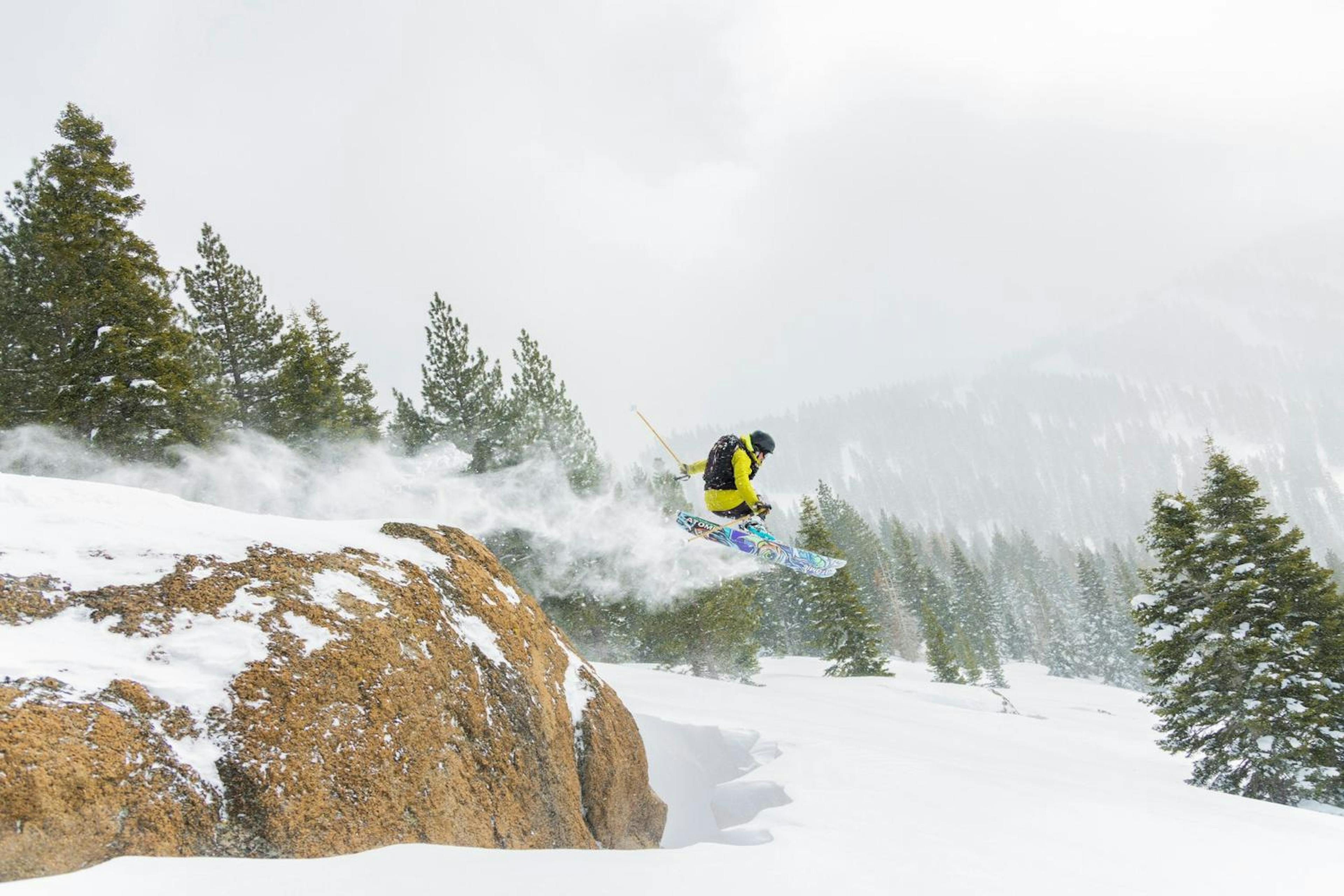 A skier jumps a cliff at Northstar California