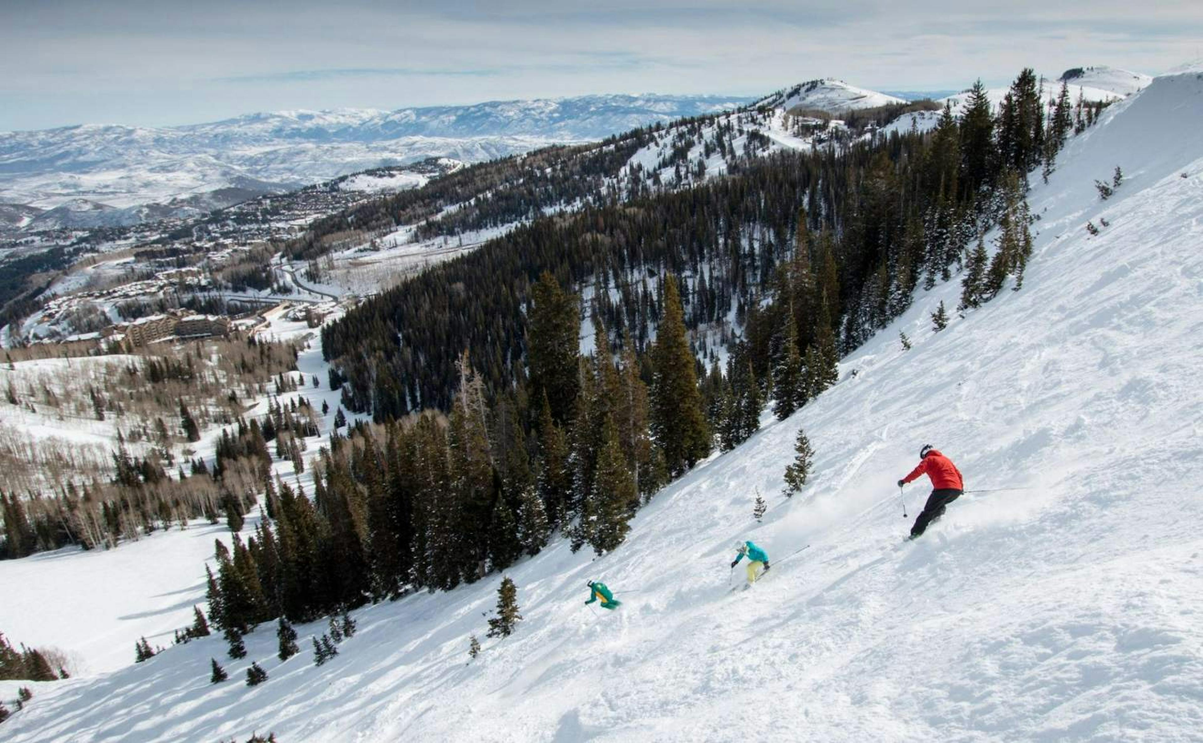 Skiers riding uncrowded terrain at Deer Valley Mountain Resort